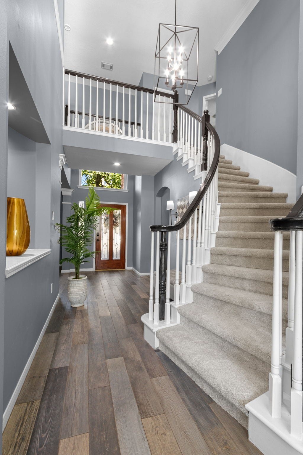 14303 Spyglen Lane, Cypress, TX 77429 Elegant staircase to the second floor