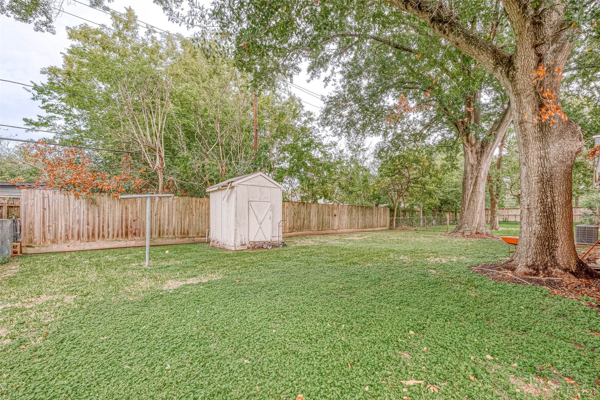 7022 Triola Lane, Houston, TX 77074 Enjoy the backyard with lots of shade.