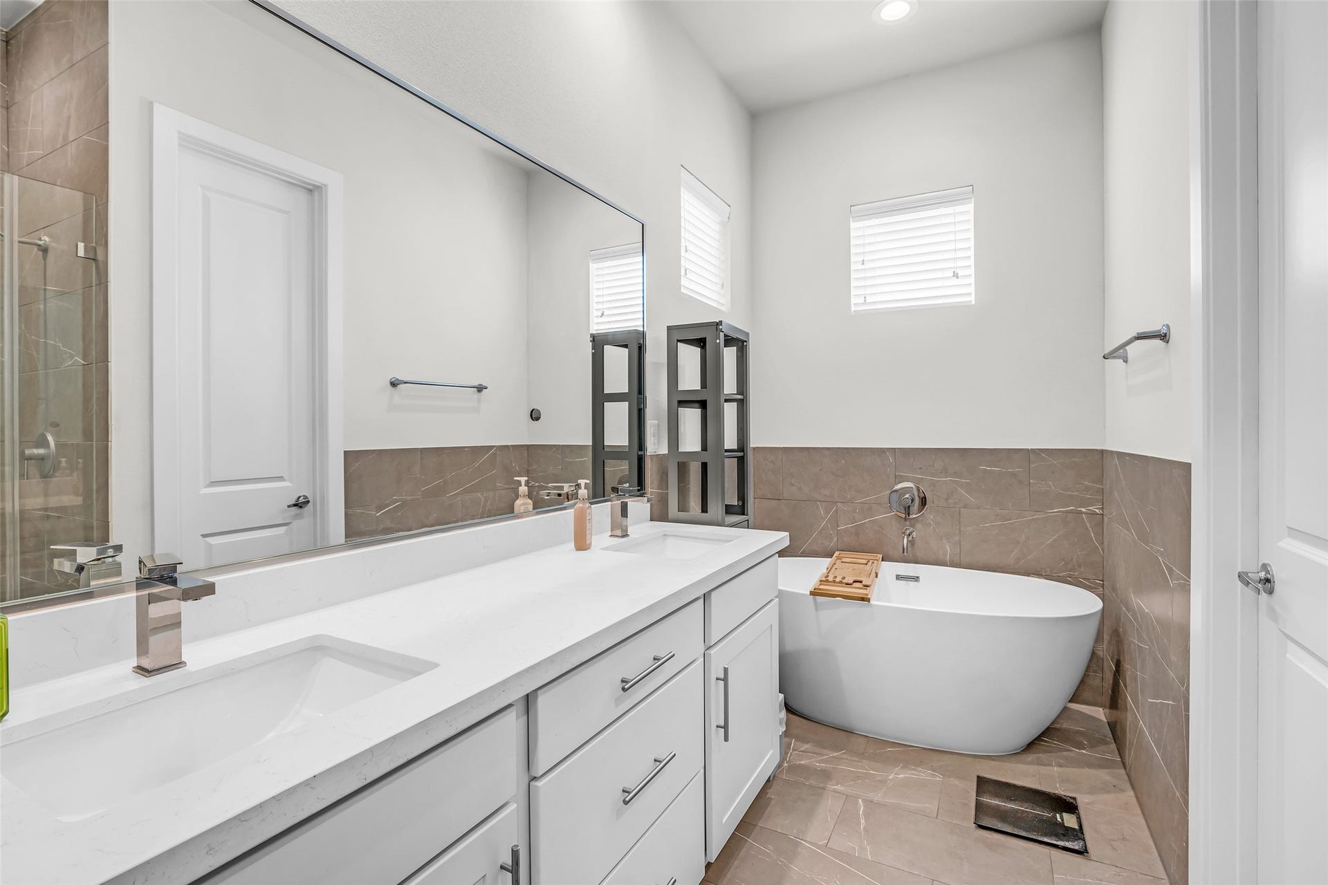 3313 Hutchins Street, Houston, TX 77004 Additional view of the main bathroom highlighting the soaking tub, along with the surrounding finishes and layout of the space.