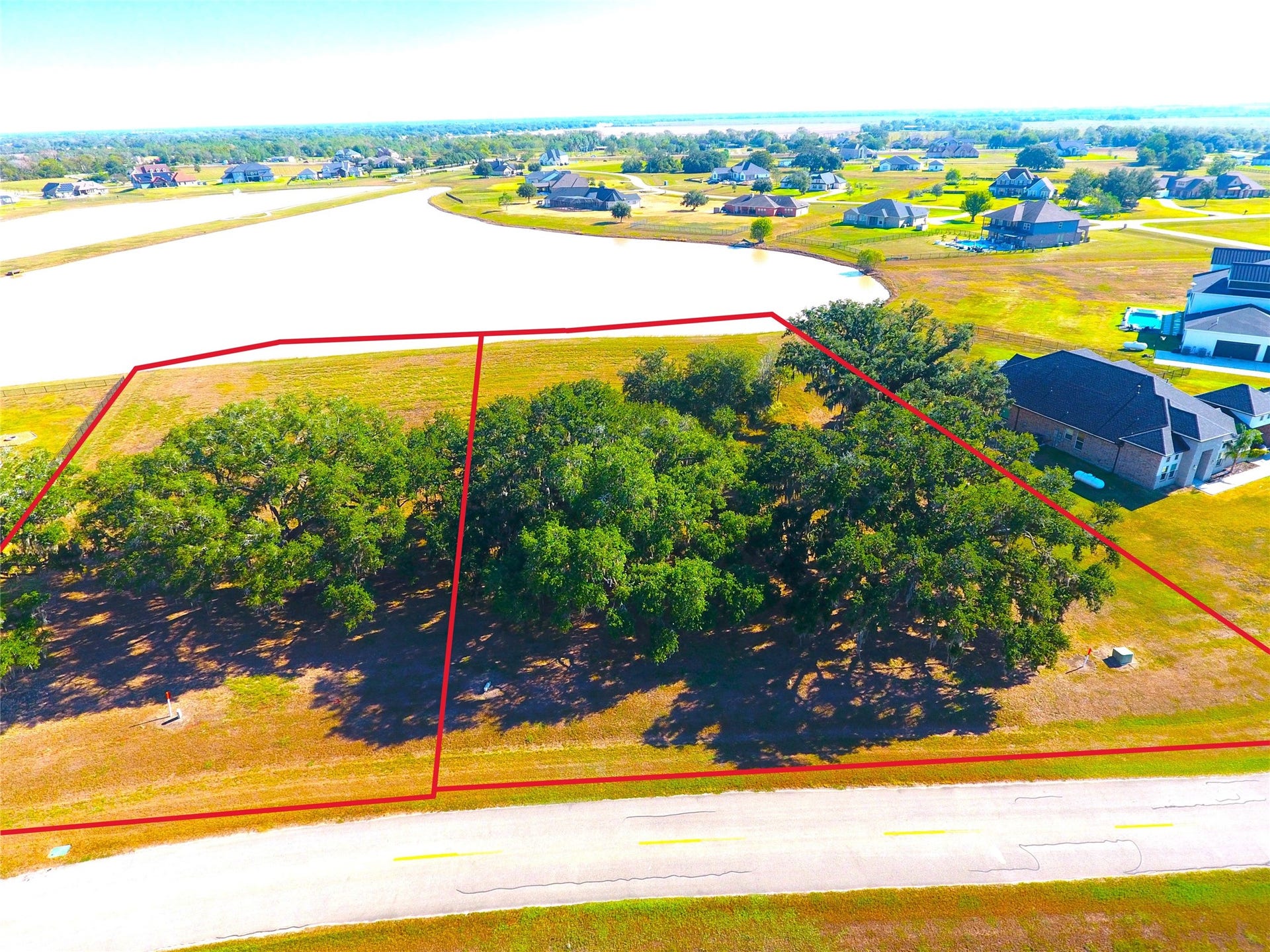 615 Lily Lane, Rosharon, TX 77583 Lot on left also available 603 Lily Ln (1 acre)