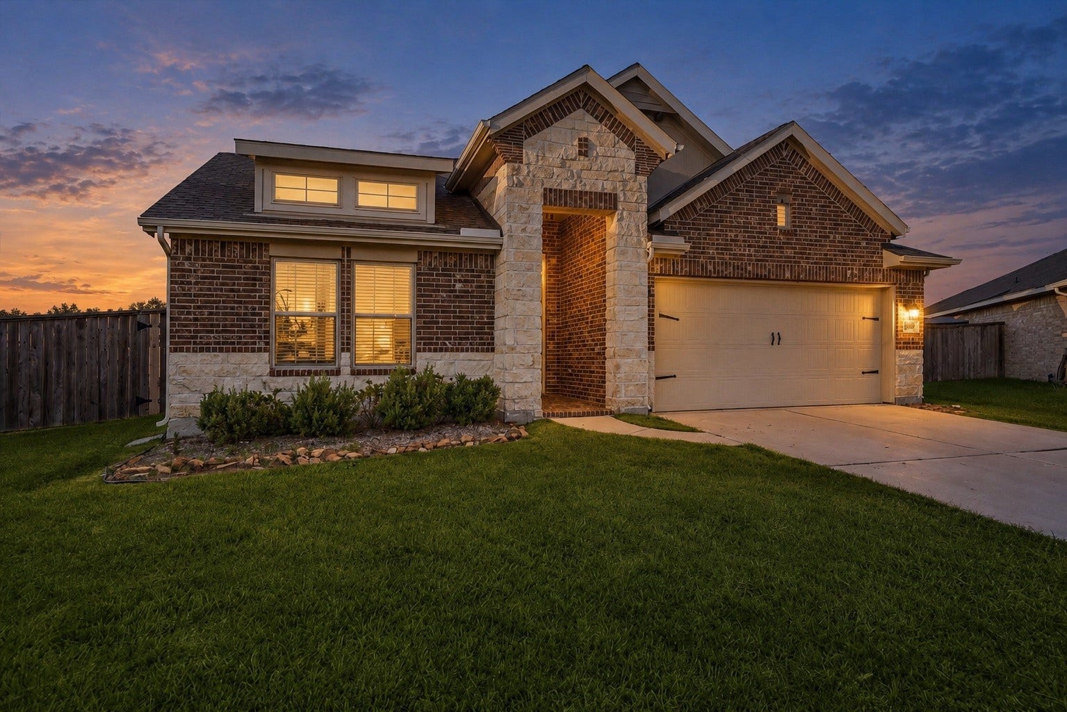 9035 Blue Star Lane, Baytown, TX 77521 Welcoming curb appeal at dusk