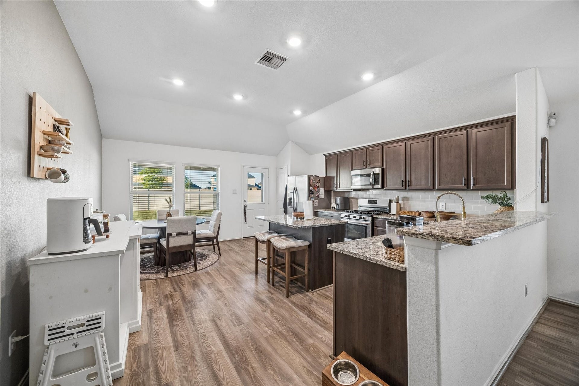 9035 Blue Star Lane, Baytown, TX 77521 Open kitchen, dining & living perfect for entertaining
