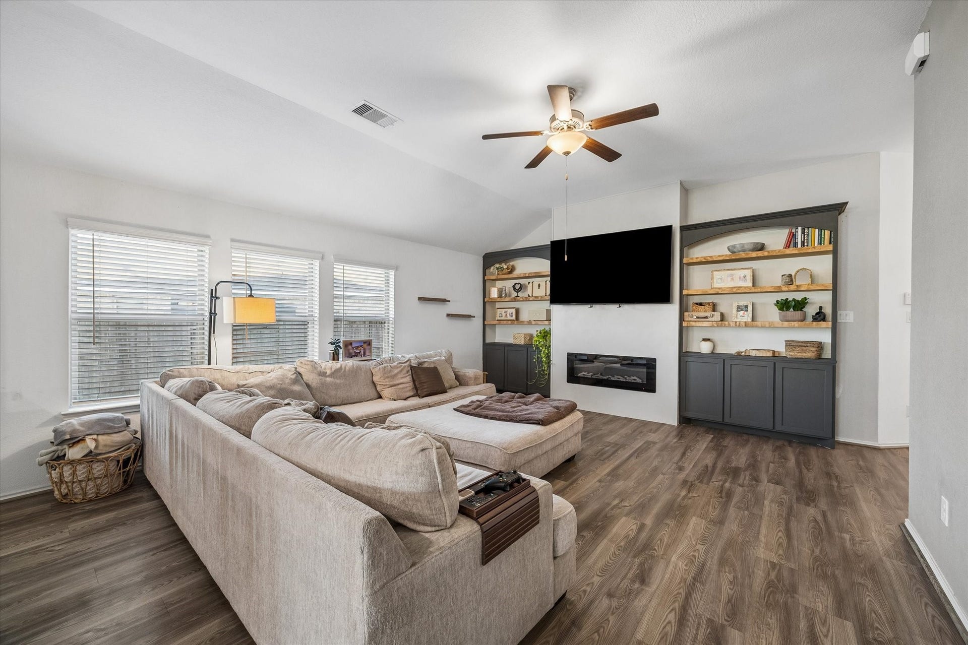 9035 Blue Star Lane, Baytown, TX 77521 Open-concept living room with natural light
