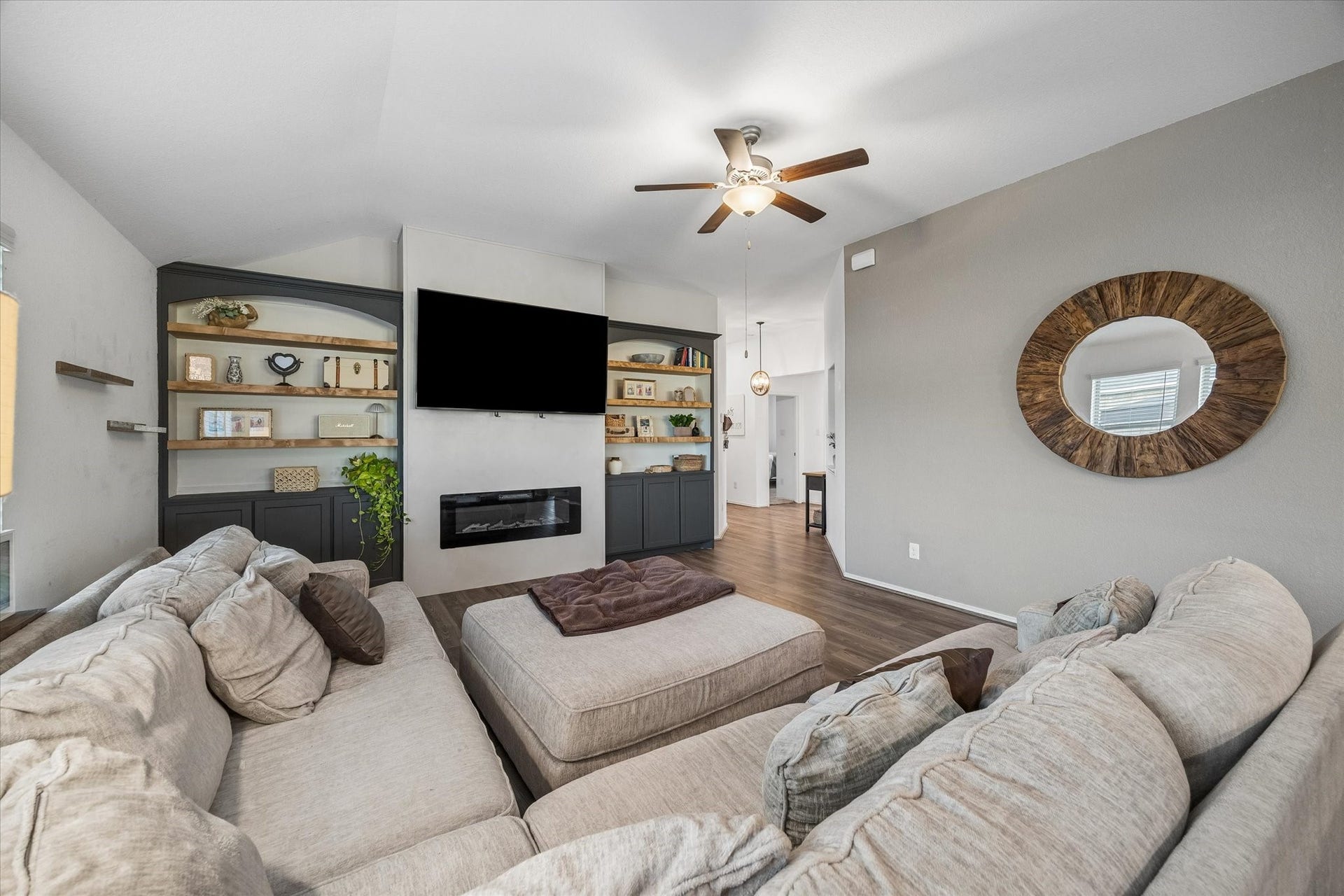 9035 Blue Star Lane, Baytown, TX 77521 Living room with custom built-ins