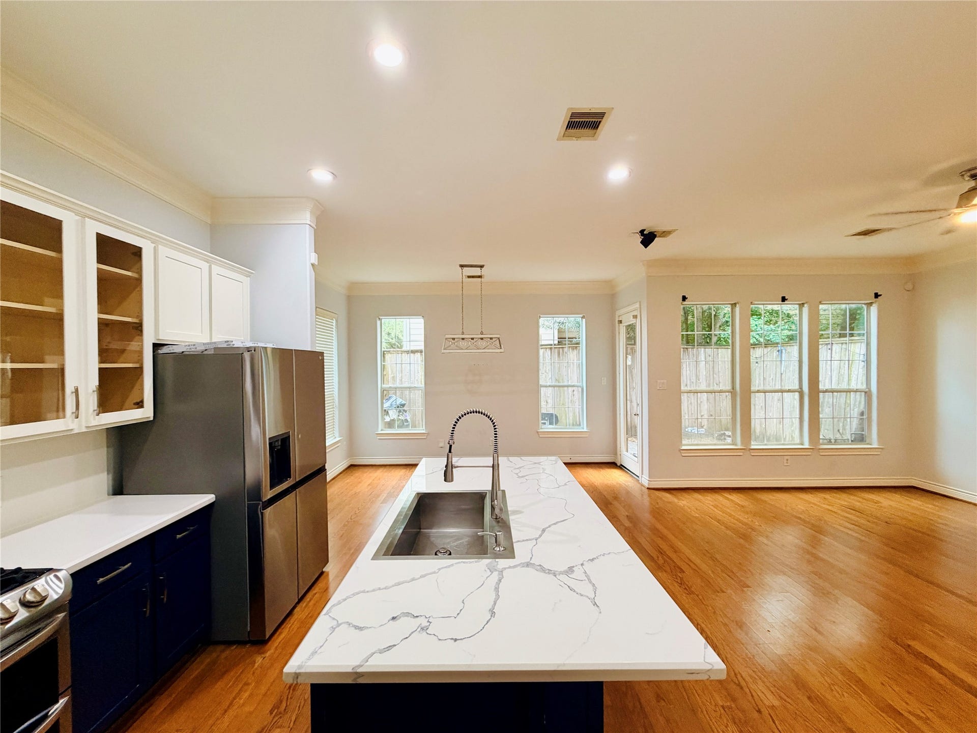 3526 Cline Street, Houston, TX 77020 Large windows along the back of the home provide plenty of natural light and views of the backyard, making this open layout perfect for everyday living throughout the kitchen and living area.