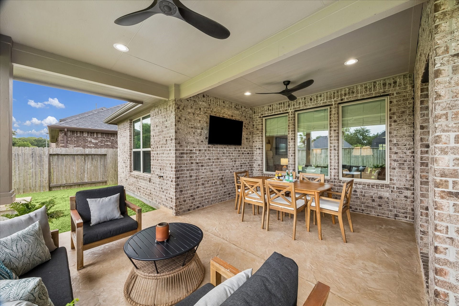 1520 Harvest Vine Court, Friendswood, TX 77546 The back patio addition added ample room to dine, entertain and relax.