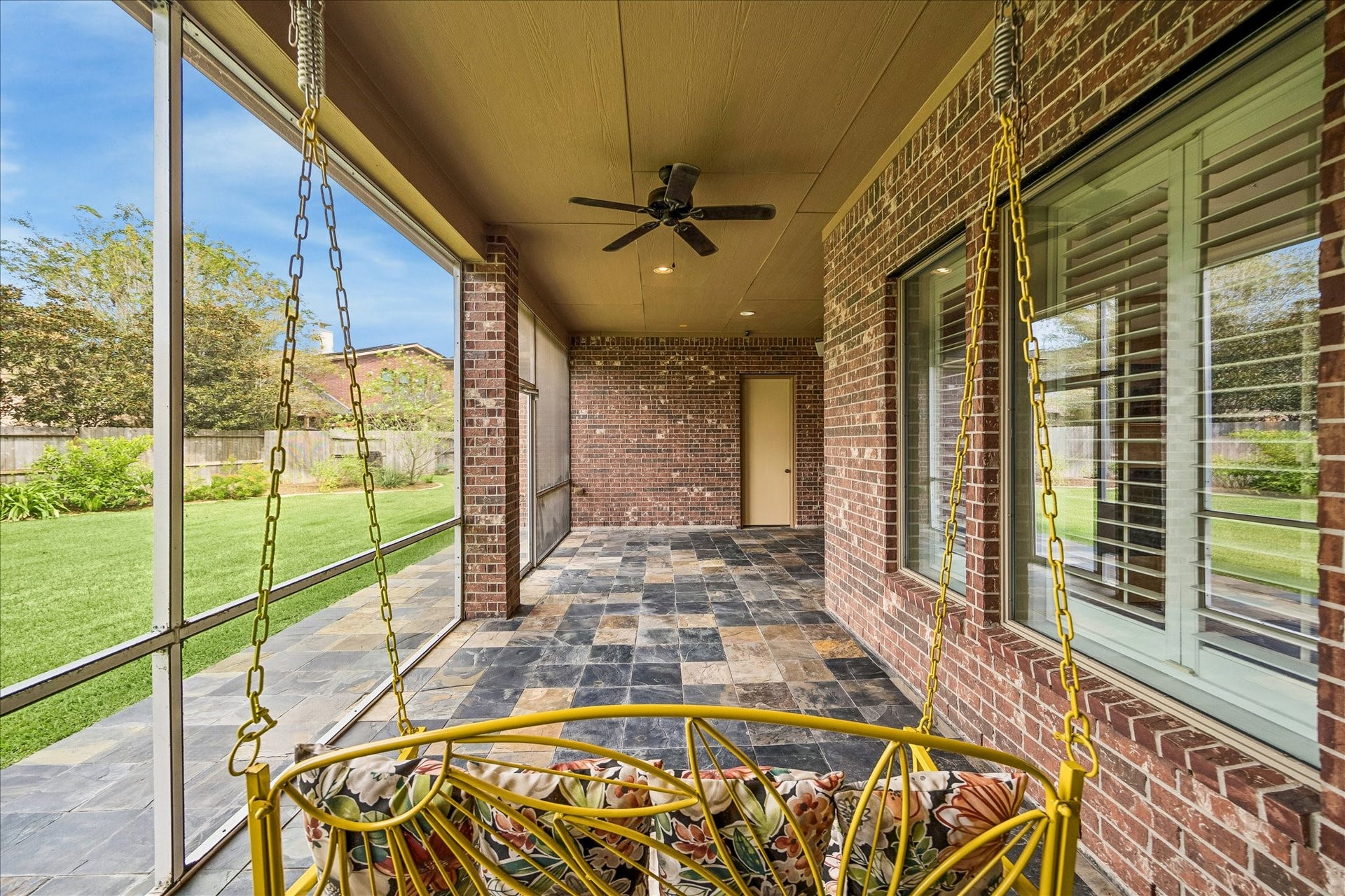 4506 Beacon View Court, Sugar Land, TX 77479 An inviting, mosquito-free spot for relaxing or entertaining. Just outside the screened area, at the far end of this photo, the rough-in plumbing for an outdoor kitchen is ready to go and includes a natural gas line.