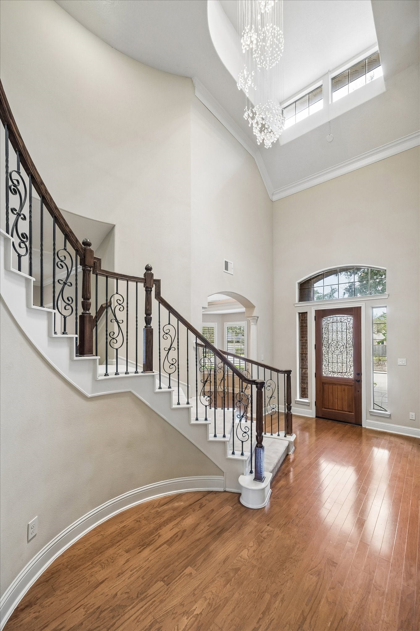 4506 Beacon View Court, Sugar Land, TX 77479 Grand foyer with 20' ceilings and custom chandelier.