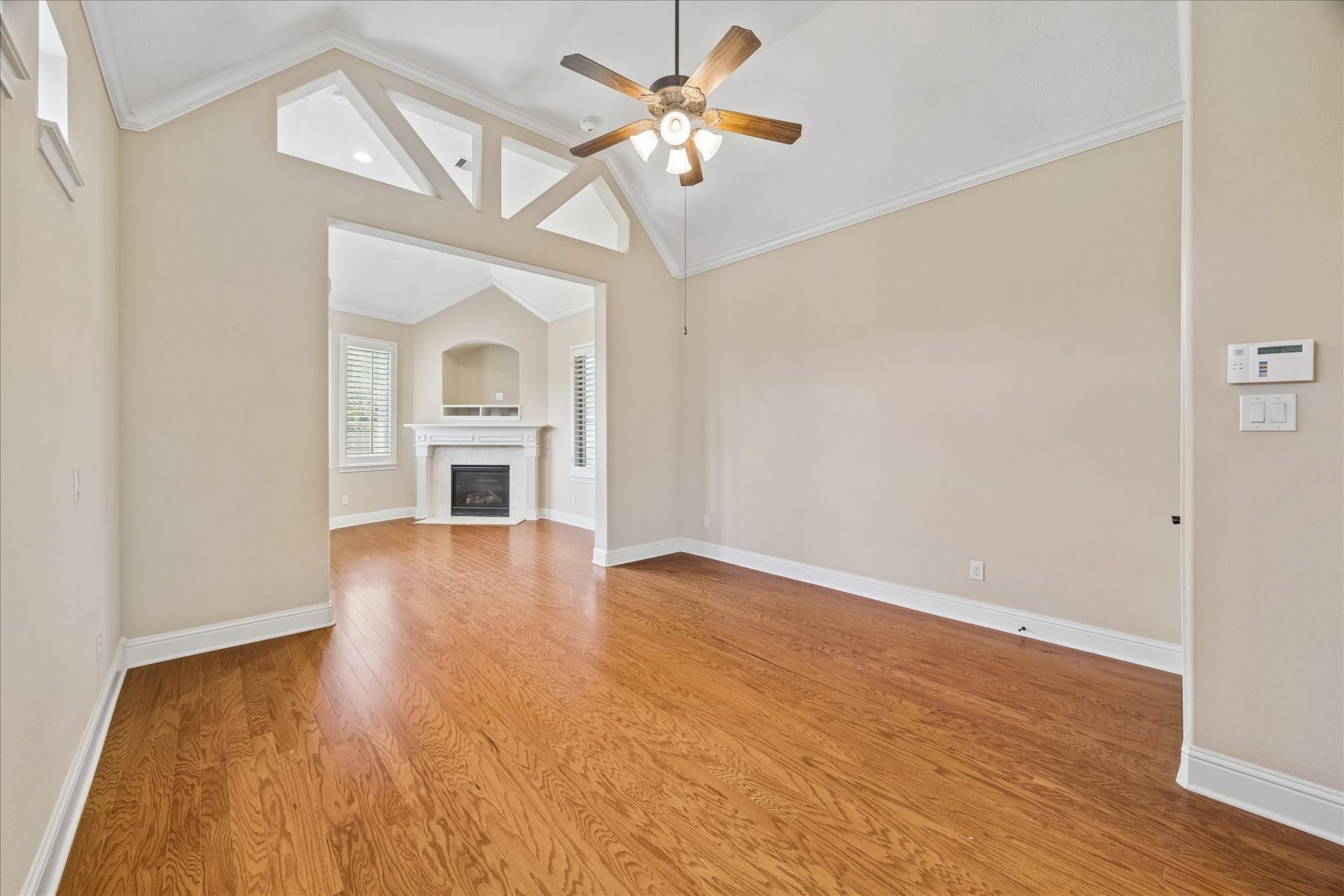 4506 Beacon View Court, Sugar Land, TX 77479 Primary suite sitting area is anchored by its gas log fireplace.