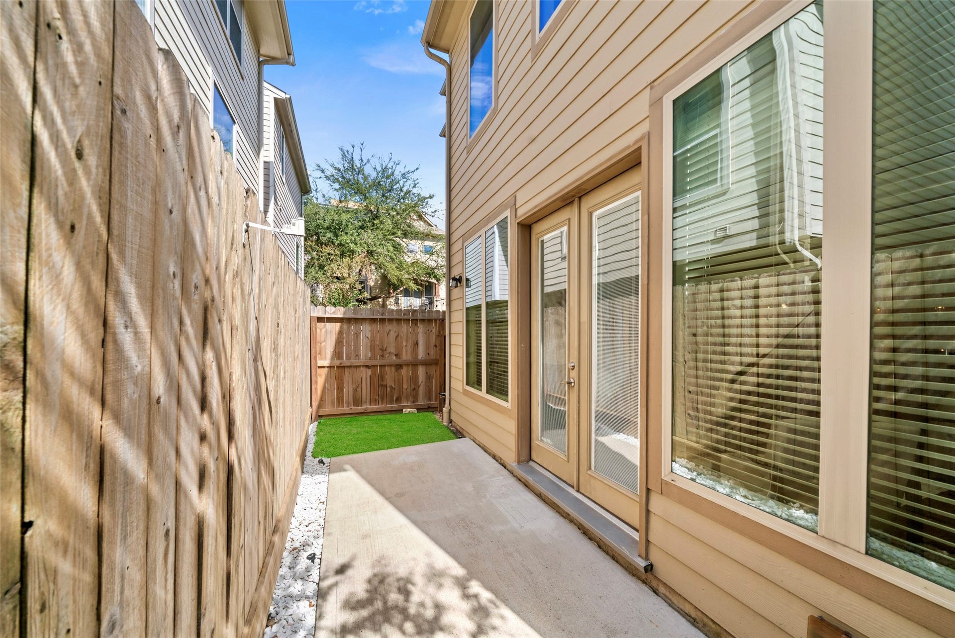 2627 Shady Woods Lane, Houston, TX 77008 Back patio with synthetic turf is easy living at its best.