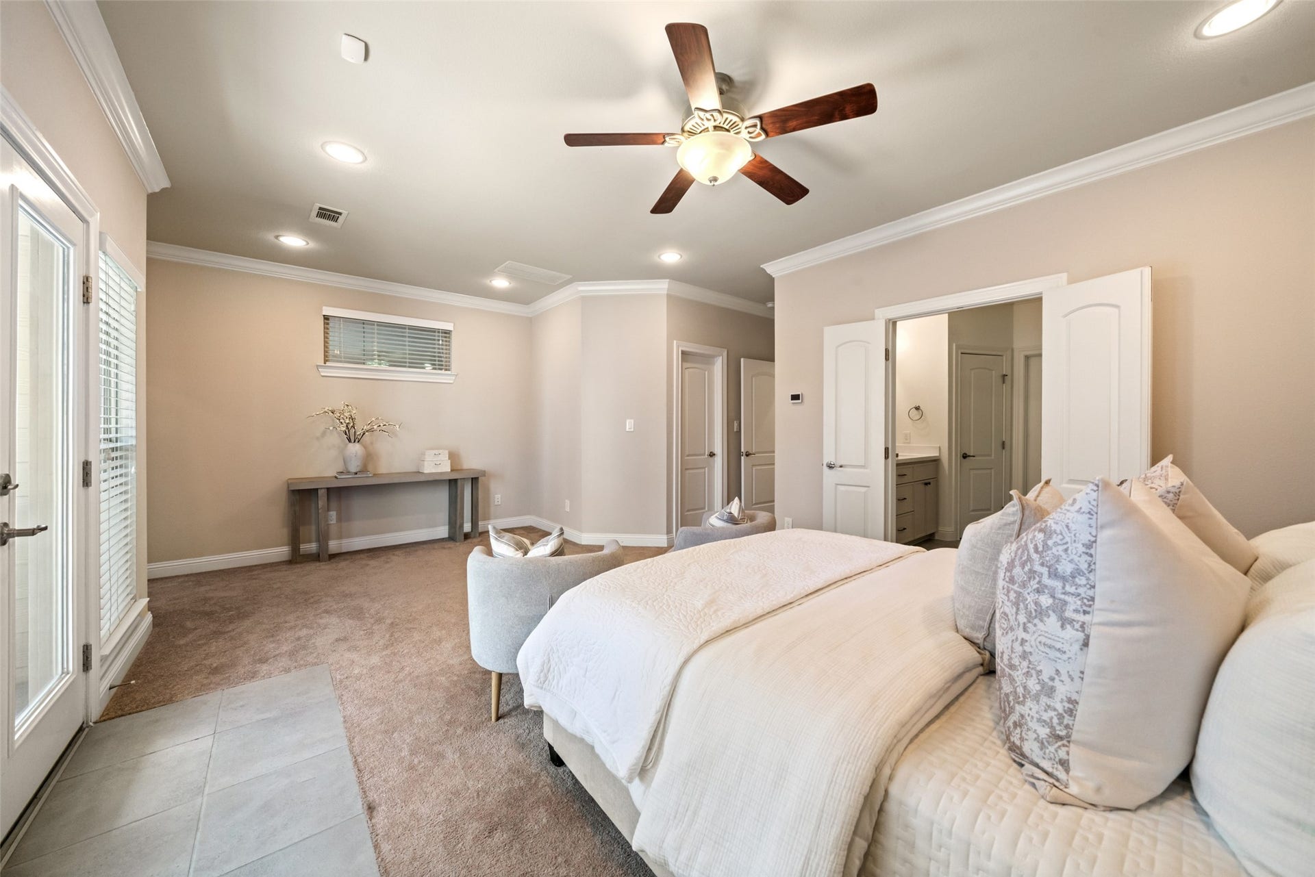 2627 Shady Woods Lane, Houston, TX 77008 Alternate view of primary suite with primary bath on right. Door at entry is the secondary walk-in closet.