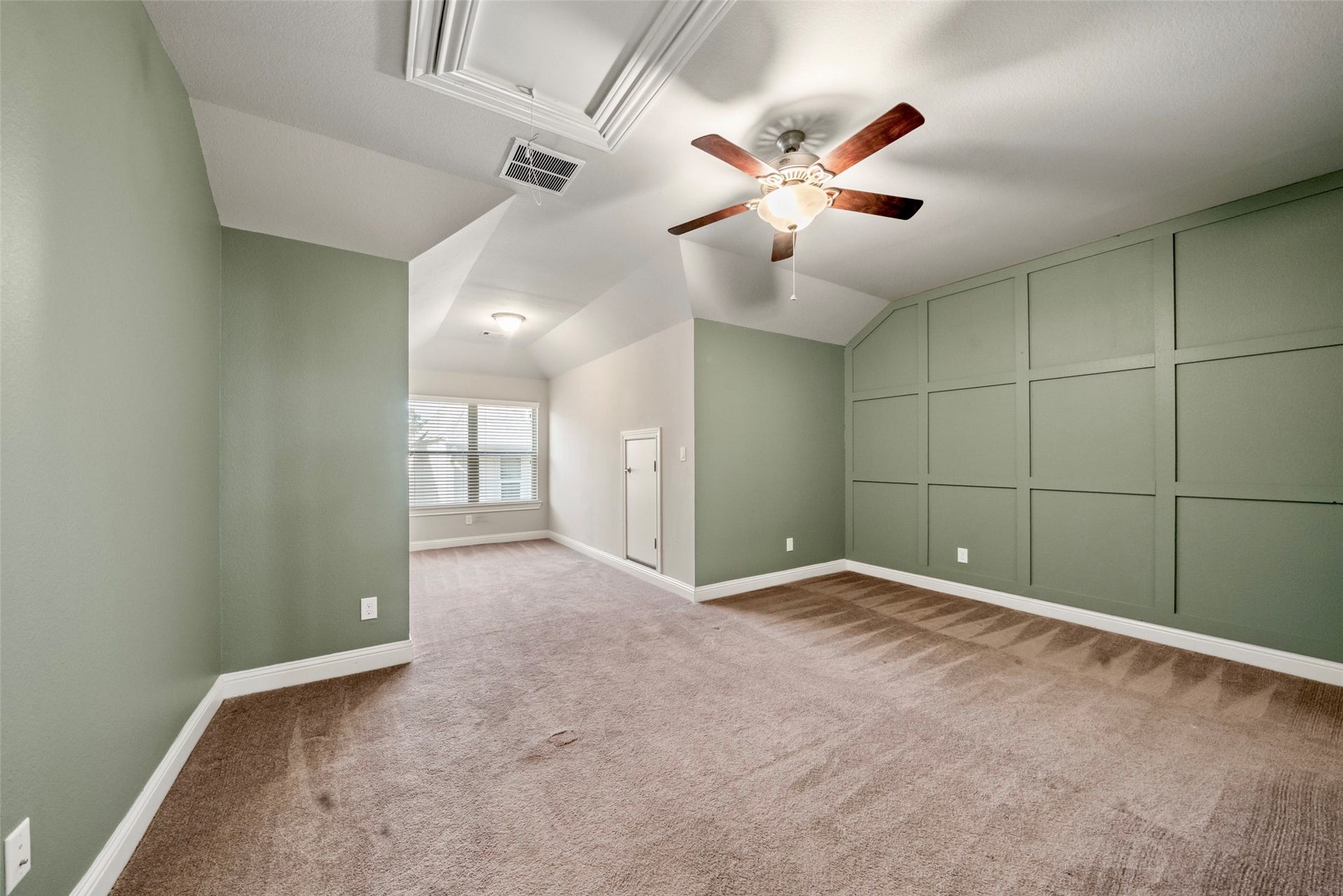 2627 Shady Woods Lane, Houston, TX 77008 Bedroom 2 with custom molding and extra space for desk, play space, reading nook, etc. Bedroom 2 & 3 have an identical layout.