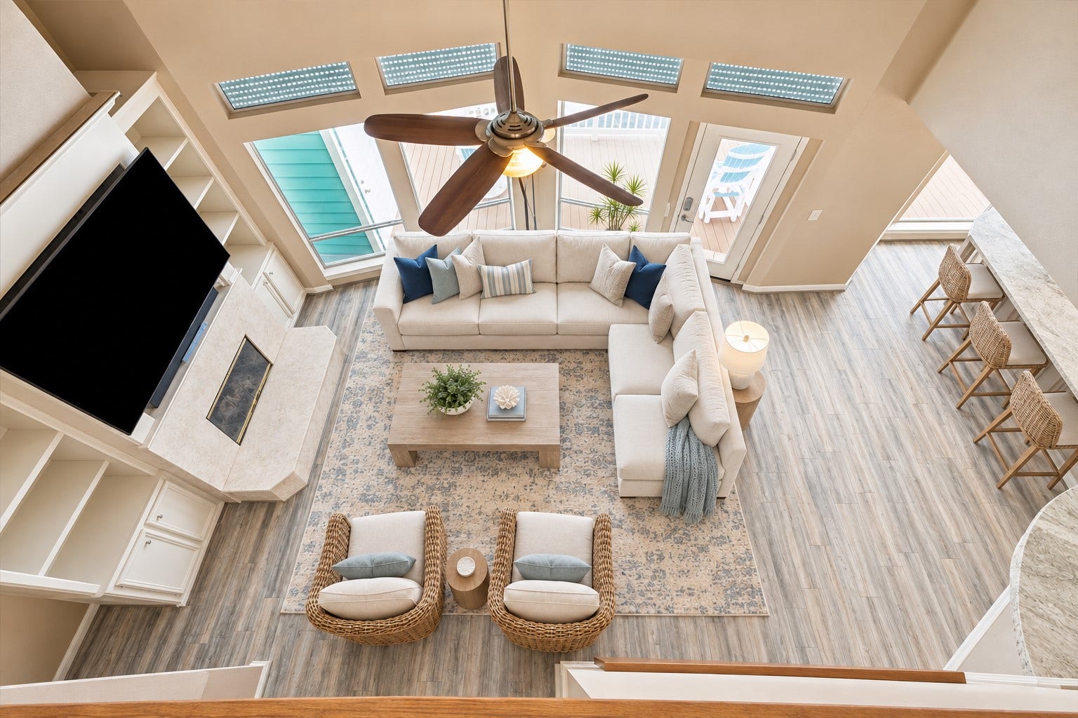 1331 EDWARDS DRIVE, Dickinson, TX 77539 THIS OVERHEAD VIEW HIGHLIGHTS THE OPEN LAYOUT, FIREPLACE, BREAKFAST BAR, AND DIRECT CONNECTION TO THE WATERFRONT BALCONY. **Virtually Staged