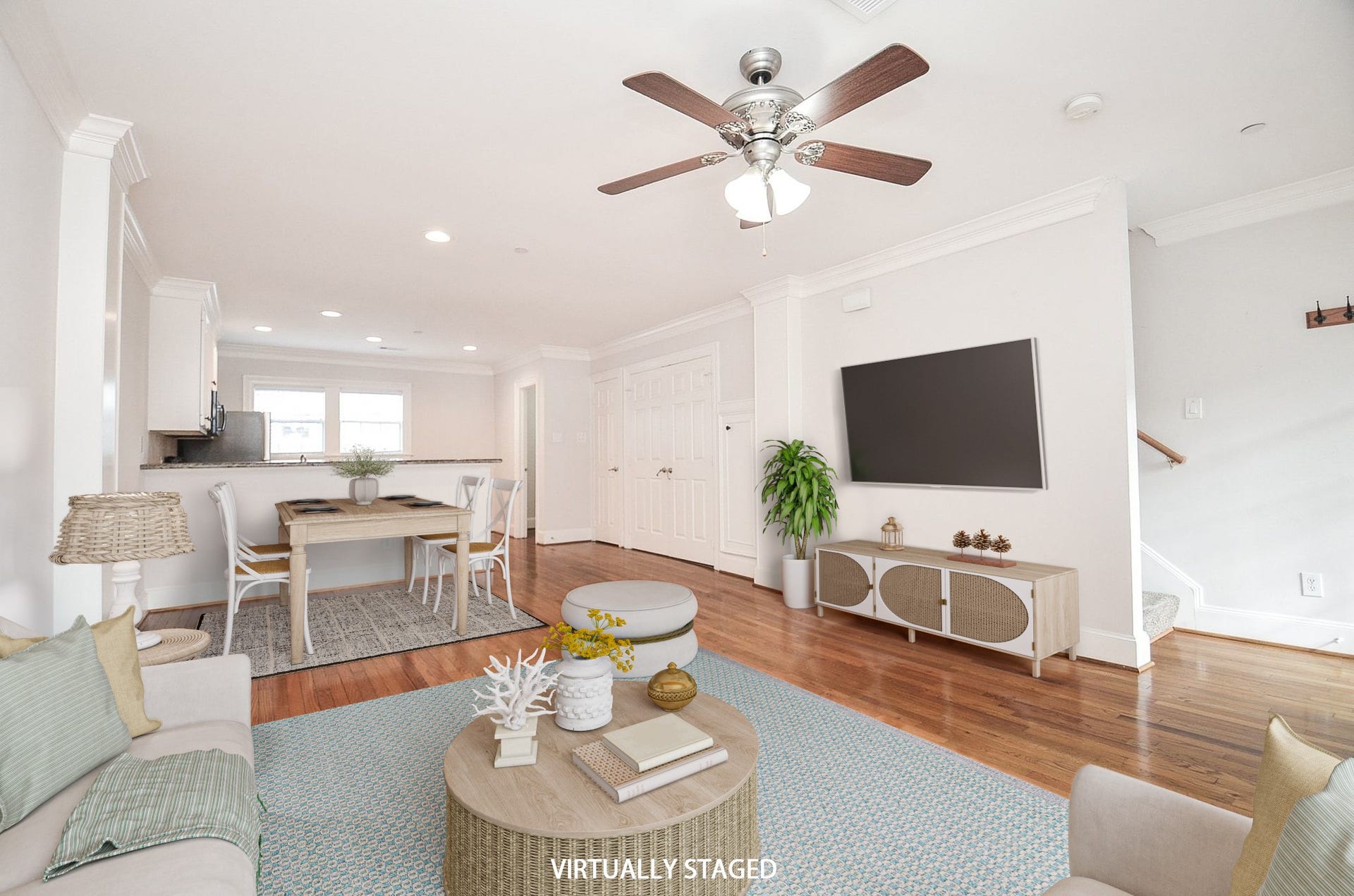 Virtually staged - Living/dining. Lots of light. Great for comfortable gatherings and entertaining.