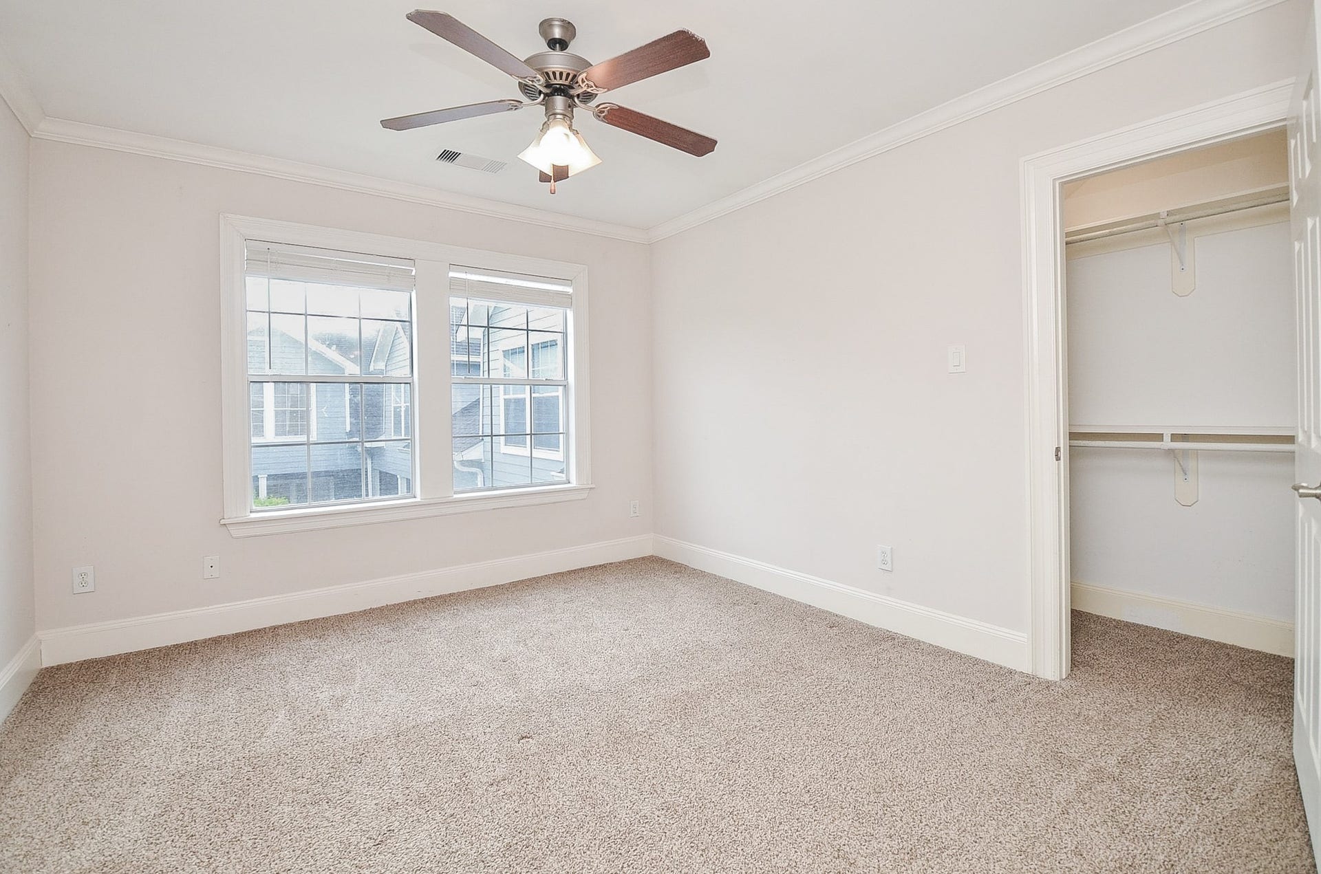 Abundant storage, a view of the pool, plush carpet and lots of natural light.