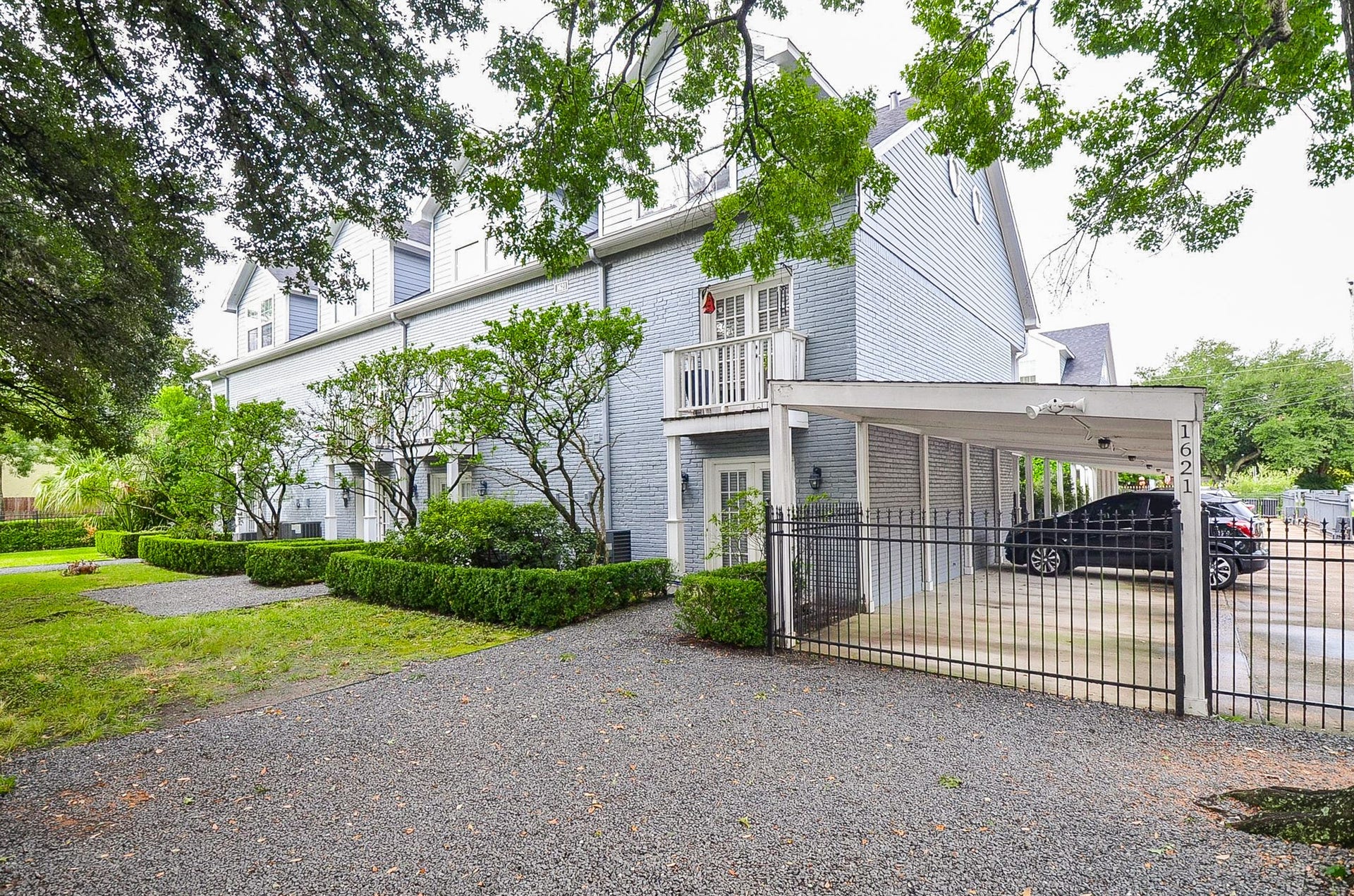 Covered carport parking for residents.
