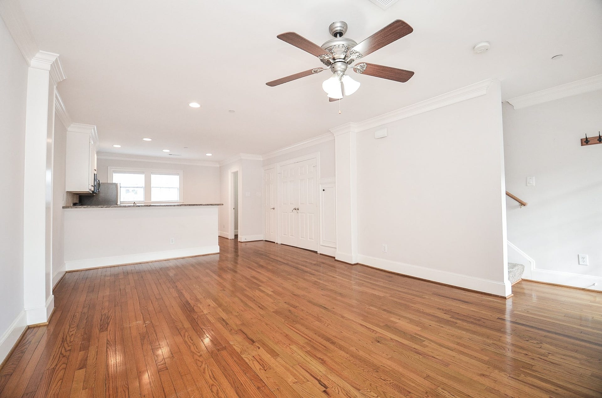 Another view of the open concept living/dining space with access to the kitchen.