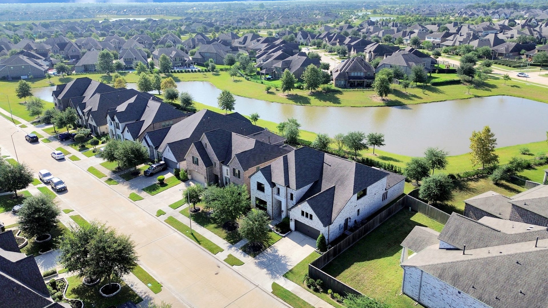 1423 Hackberry Heights Drive, Richmond, TX 77406 Nestled in a serene neighborhood, this home offers stunning water views and a picturesque setting. Ideal for families, it features a spacious yard and proximity to scenic walking paths.