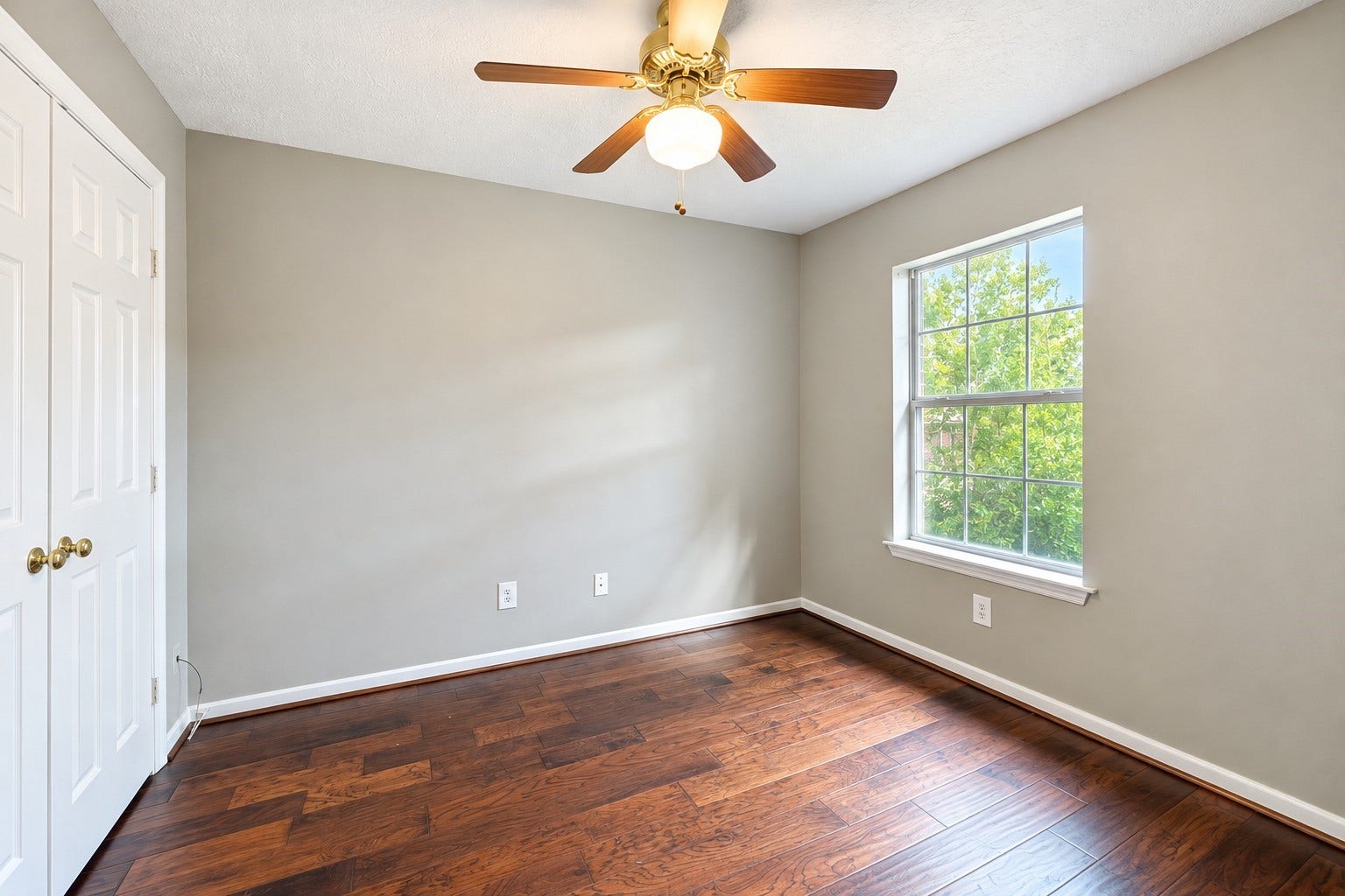 17510 Tall Maple Court, Houston, TX 77095 Upstairs secondary bedroom featuring beautiful wood flooring, neutral paint, natural light, and a closet. Previously used as a home office, offering flexibility to suit your needs.