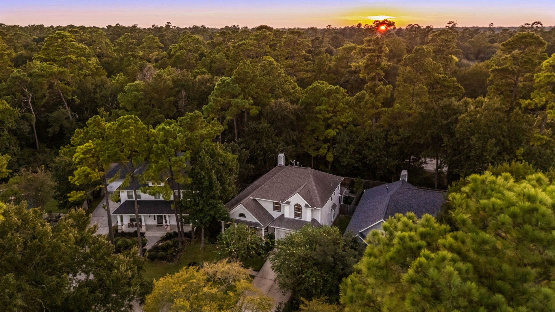 23 Pipers Meadow Street, The Woodlands, TX 77382 Experience the true essence of The Woodlands. This elevated view showcases the incredible privacy, woodsy charm, and peaceful natural surroundings that define this master-planned community.