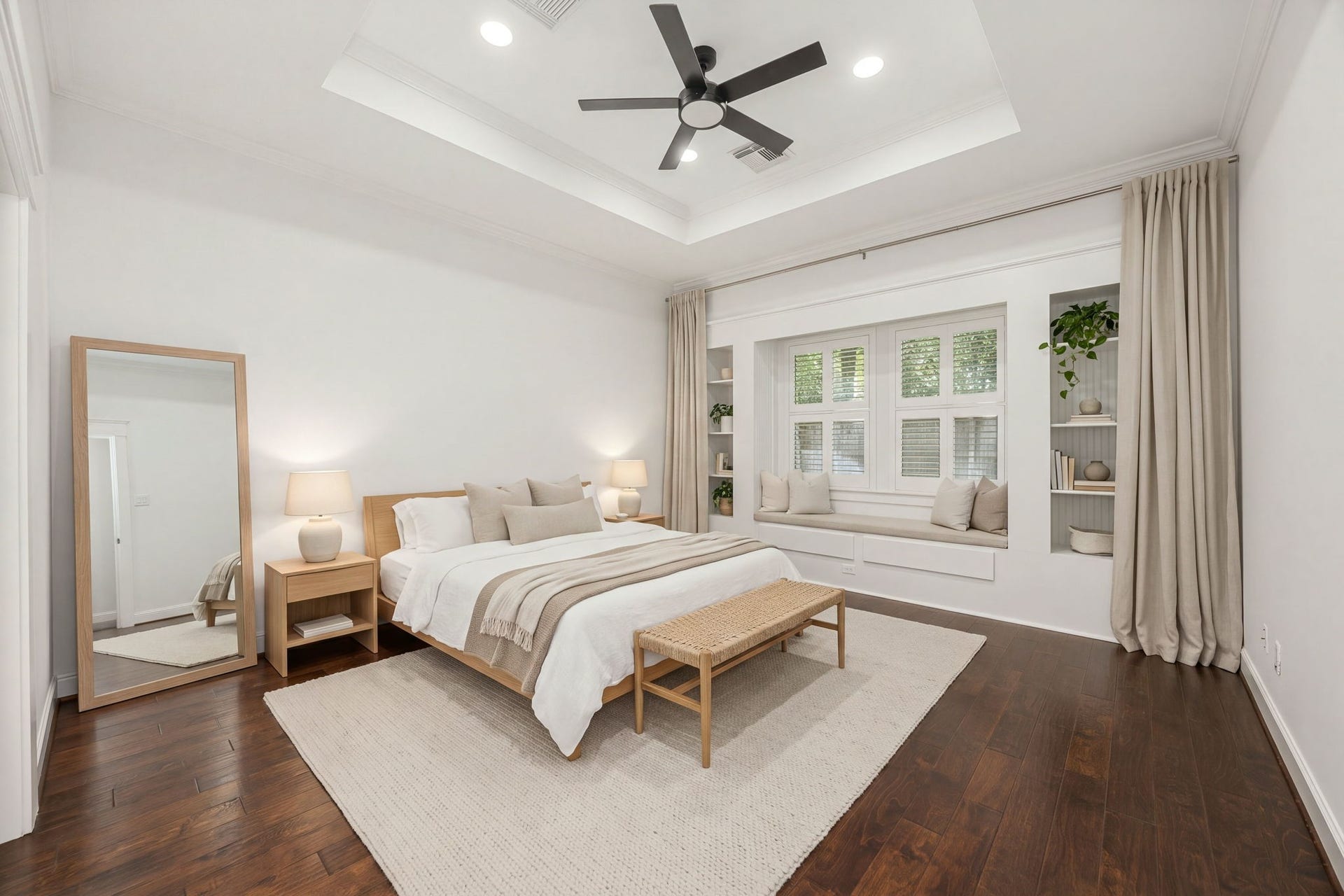 23 Pipers Meadow Street, The Woodlands, TX 77382 Unwind in the serene primary suite, designed as the ultimate end-of-day retreat. A highlight of the room is the stunning built-in window seat flanked by custom shelvingthe perfect nook for reading or relaxing. *Virtually Staged