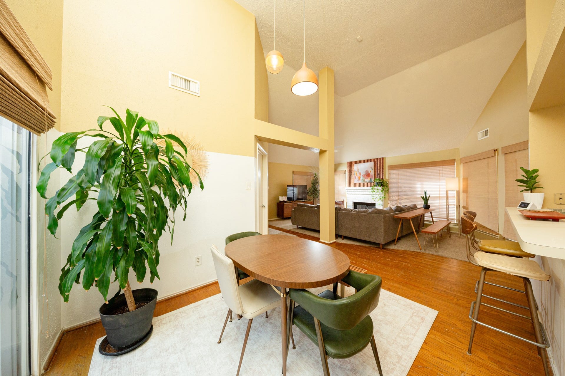 2107 Foundary Drive, Katy, TX 77493 Warm wood flooring flows throughout the main living areas, while vaulted ceilings and an open layout create a bright, airy atmosphere.