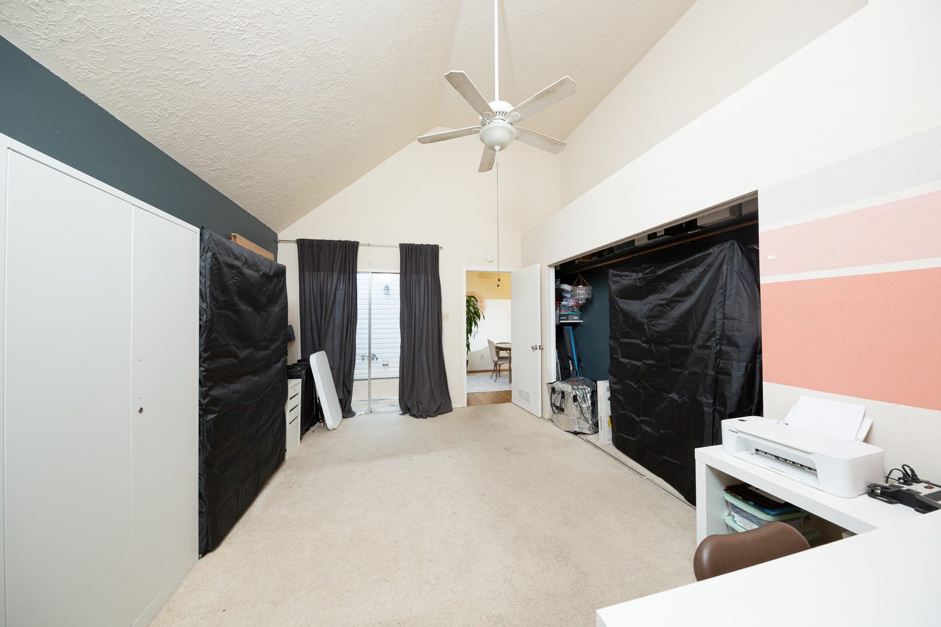 2107 Foundary Drive, Katy, TX 77493 The primary bedroom features vaulted ceilings, a ceiling fan, neutral finishes, and a versatile layout to suit your needs.