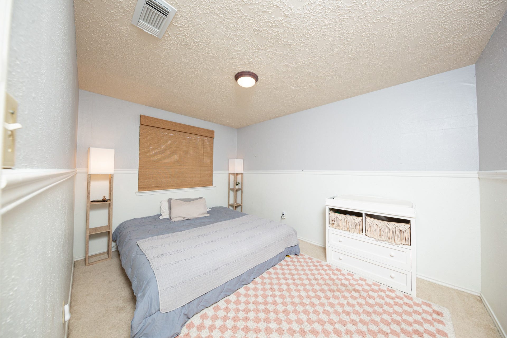 2107 Foundary Drive, Katy, TX 77493 An additional secondary bedroom features vaulted ceilings, a ceiling fan, neutral finishes, and a versatile layout to suit your needs.
