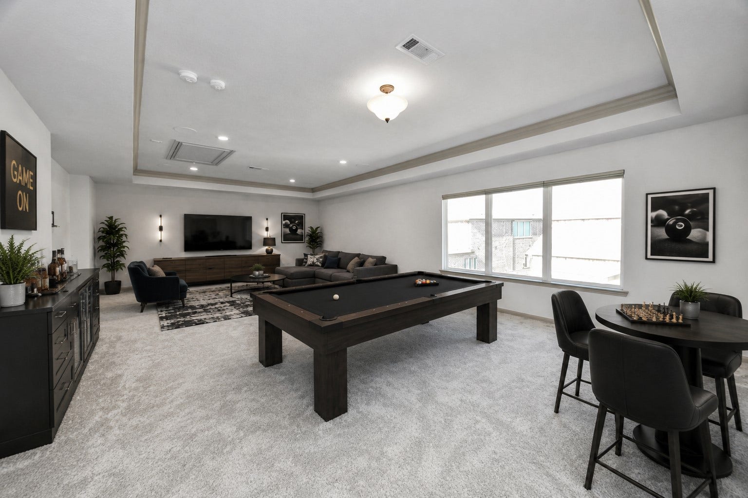 1423 Hackberry Heights Drive, Richmond, TX 77406 Spacious game room featuring a sleek billiards table, cozy seating area, and ample natural light, perfect for entertainment and relaxation.