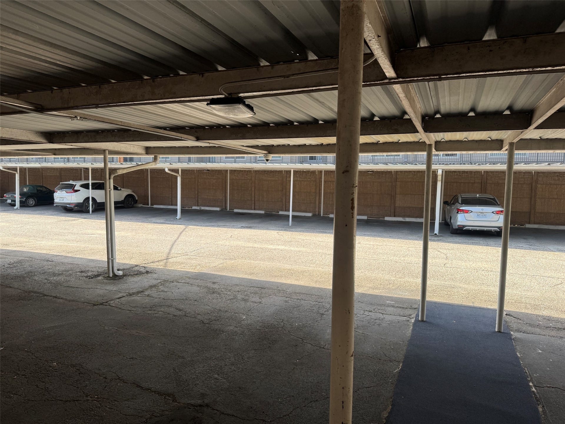 2600 Bellefontaine Street, #A18, Houston, TX 77025 Parking area with 2 covered spaces