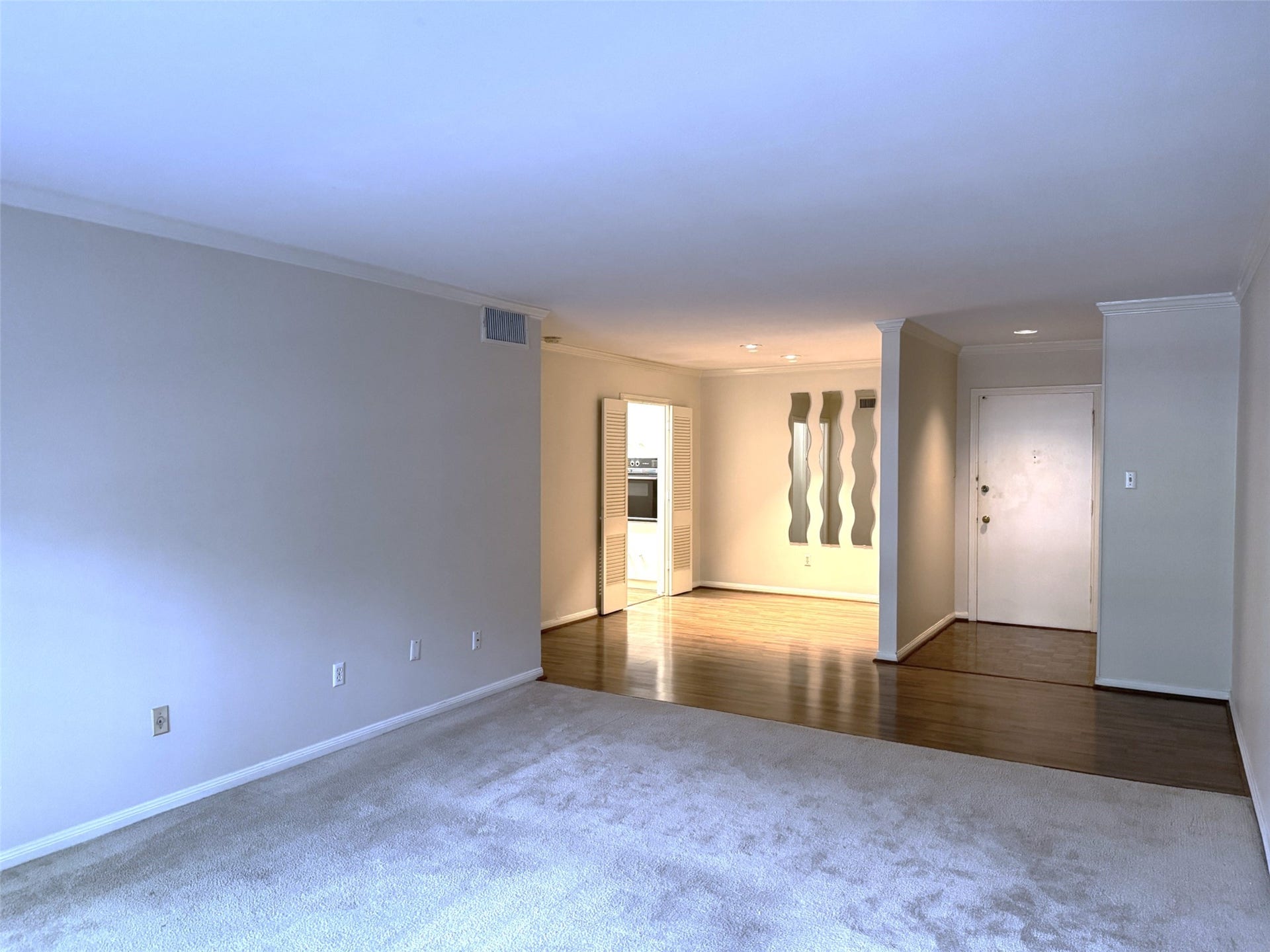 2600 Bellefontaine Street, #A18, Houston, TX 77025 Living area with dining and entry hall in background