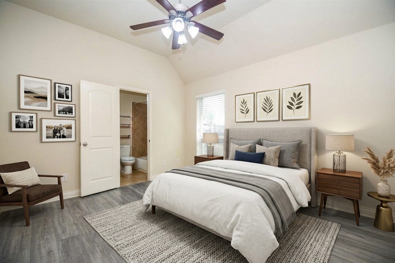 Spacious bedroom with stylish dcor, featuring a cozy bed, elegant artwork, and an ensuite bathroom, all highlighted by natural light and warm tones.  AI designed