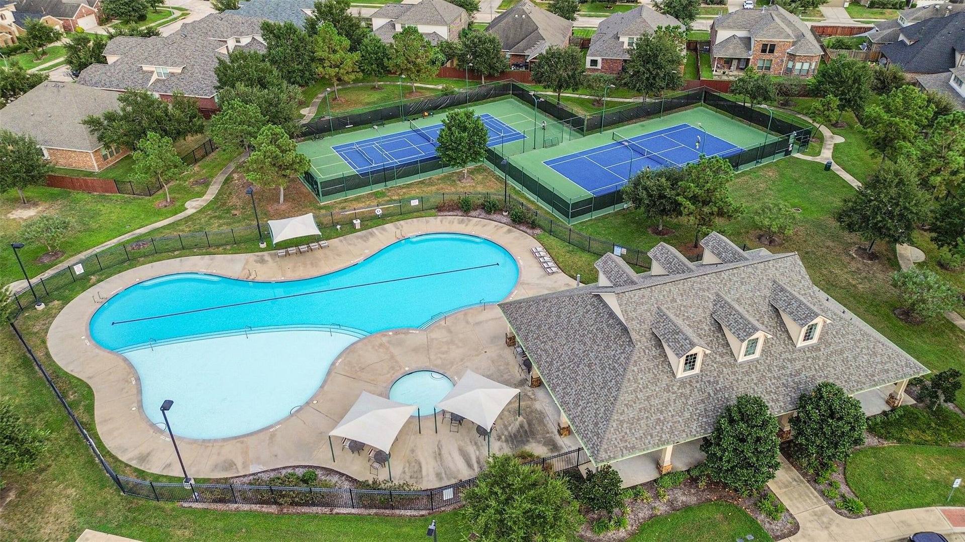 26926 Carmel Falls Lane, Katy, TX 77494 Cinco Ranch offers community pools, tennis courts and many more amenitites.