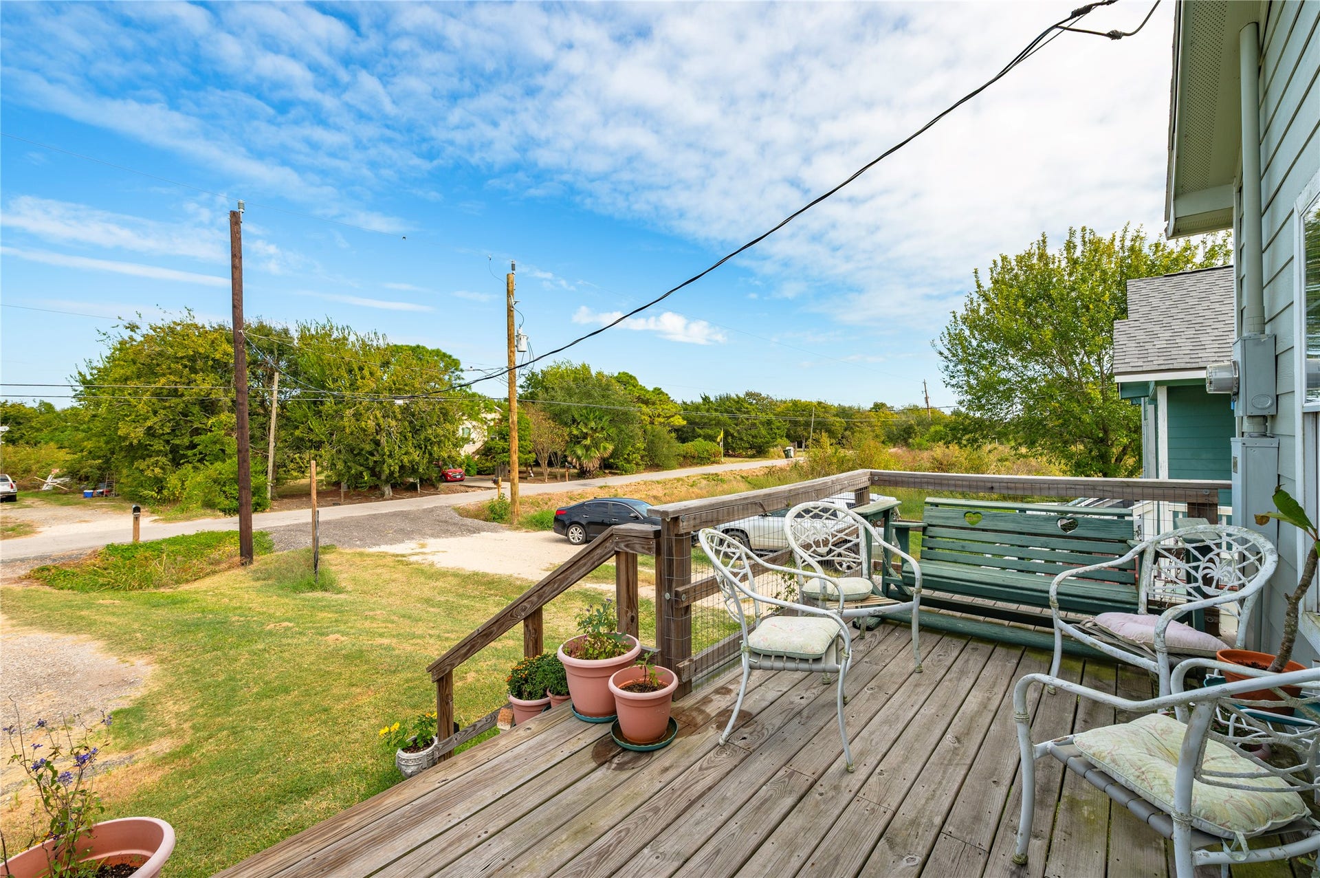 2337 Avenue D, San Leon, TX 77539 Front deck gives you elevated views out into the frontyard of the property.