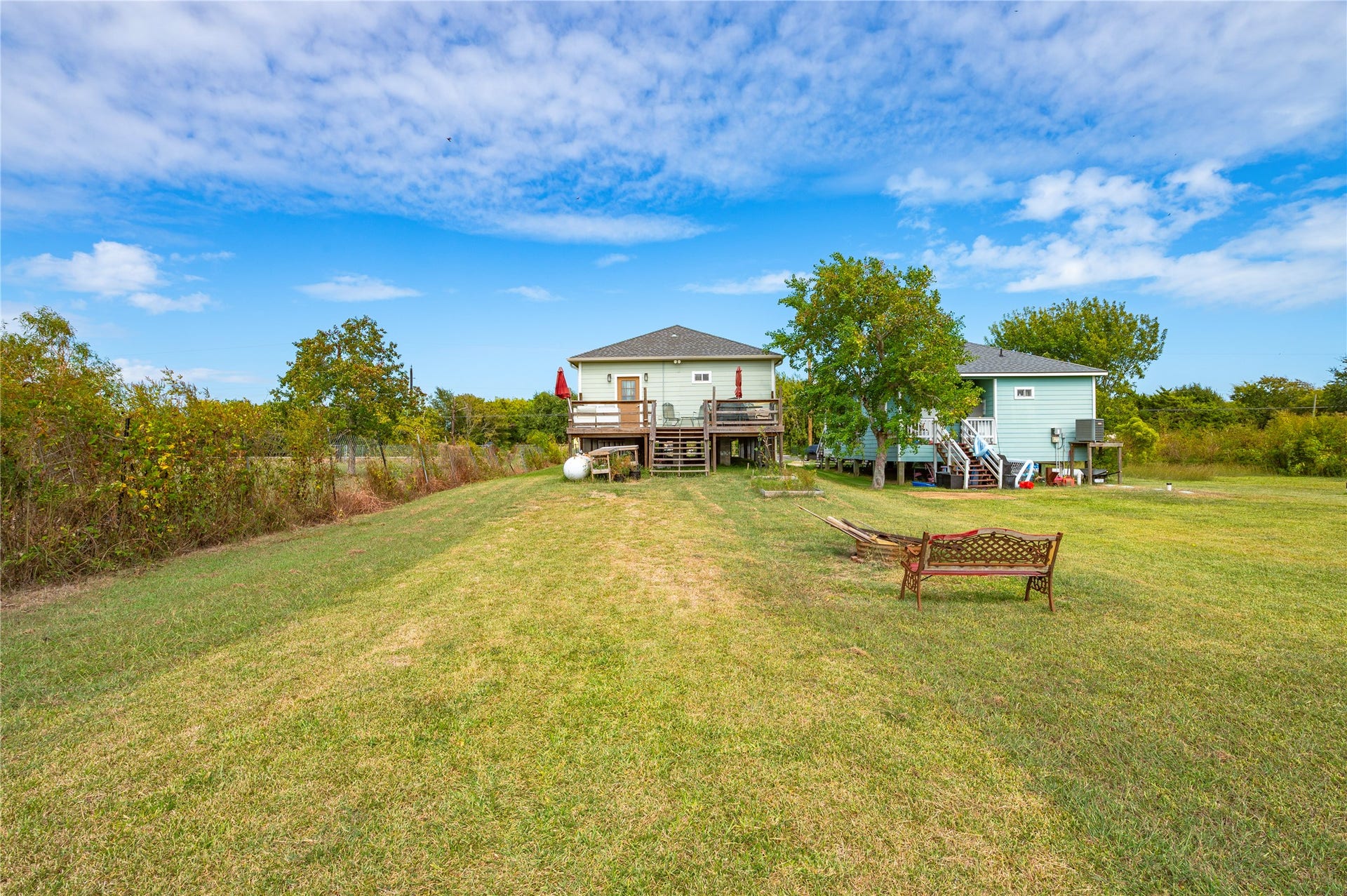 2337 Avenue D, San Leon, TX 77539 Another view of the large backyard and home.