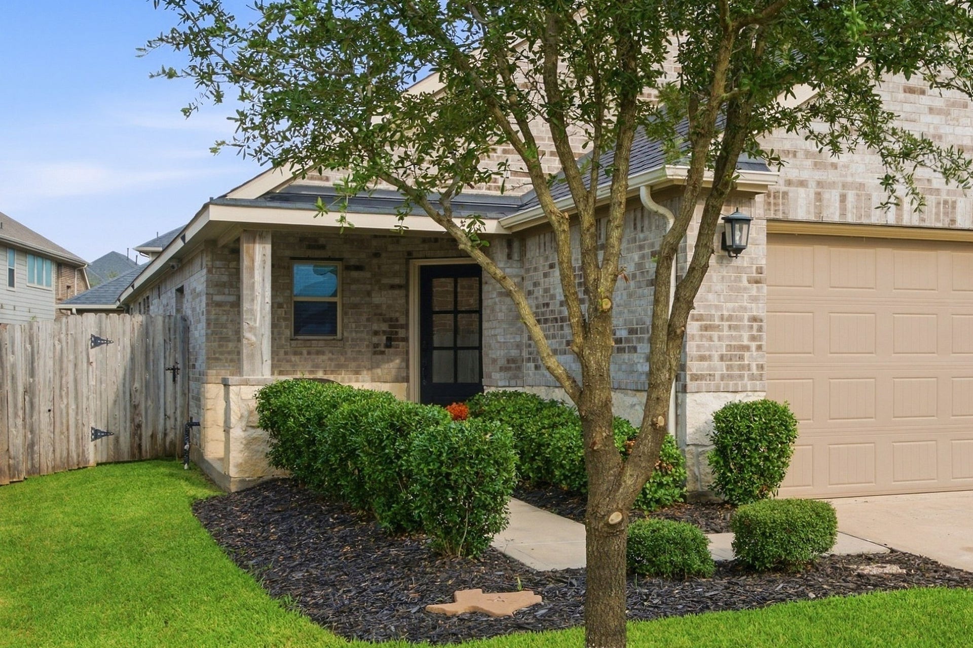 17410 Farm Pasture Trail, Hockley, TX 77447 Nicely landscaped front with inviting entry.