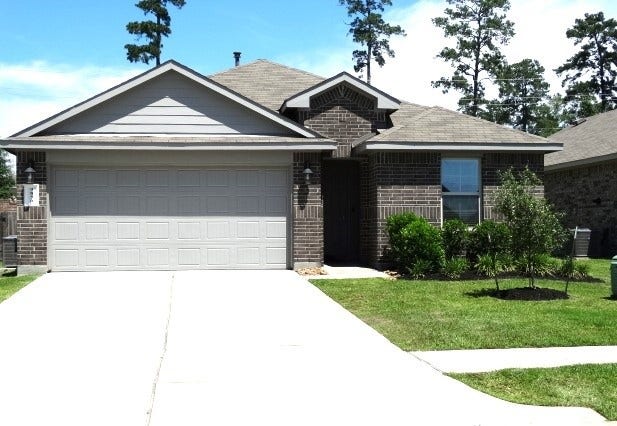 14206 West Rim Lane, Conroe, TX 77384 Photos displayed may be of similar units or floor plans featuring the same finishes