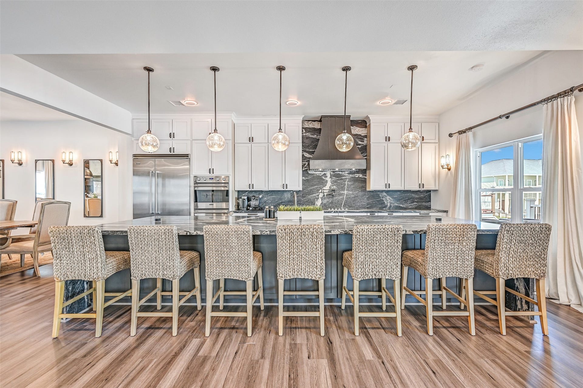 1614 Castaway Street, Tiki Island, TX 77554 Ready when the guest list grows, this kitchen pairs Viking appliances with extensive cabinetry and generous work space. From seafood dinners to holiday feasts, there is room to make hosting part of the fun.