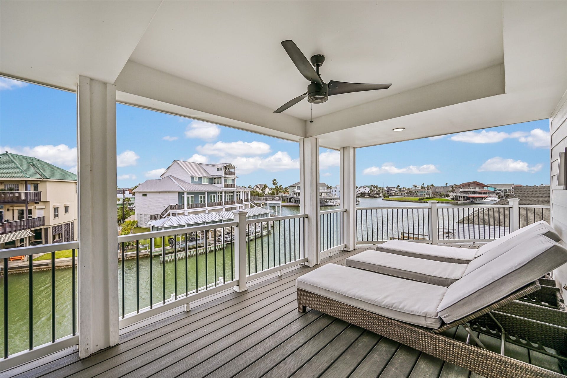 1614 Castaway Street, Tiki Island, TX 77554 Claim this spot for morning coffee before the rest of the house wakes up. Wide canal views make it just as inviting for an afternoon break or evening drink.