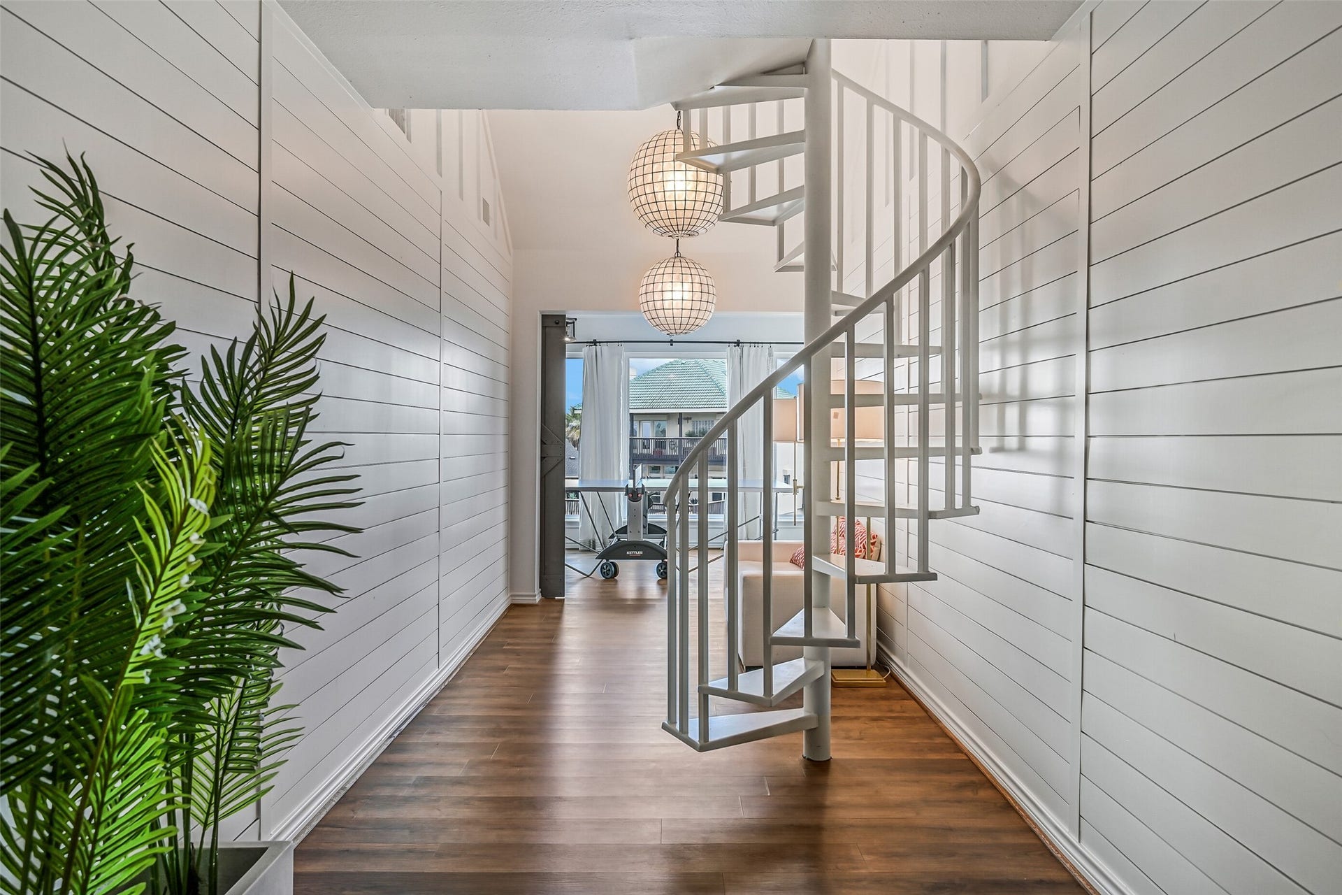 1614 Castaway Street, Tiki Island, TX 77554 Two staircases help a home of this scale flow naturally between levels. Everyone can move easily between private retreats and shared gathering spaces.