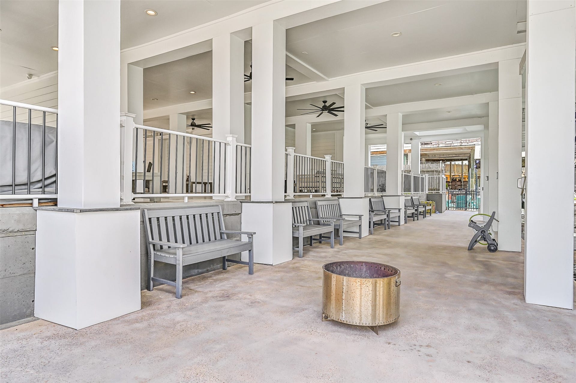 1614 Castaway Street, Tiki Island, TX 77554 Bare feet and swimsuits welcome. Covered outdoor living connects the pool, dock and canal, making it easy for an entire Tiki day to unfold outside.