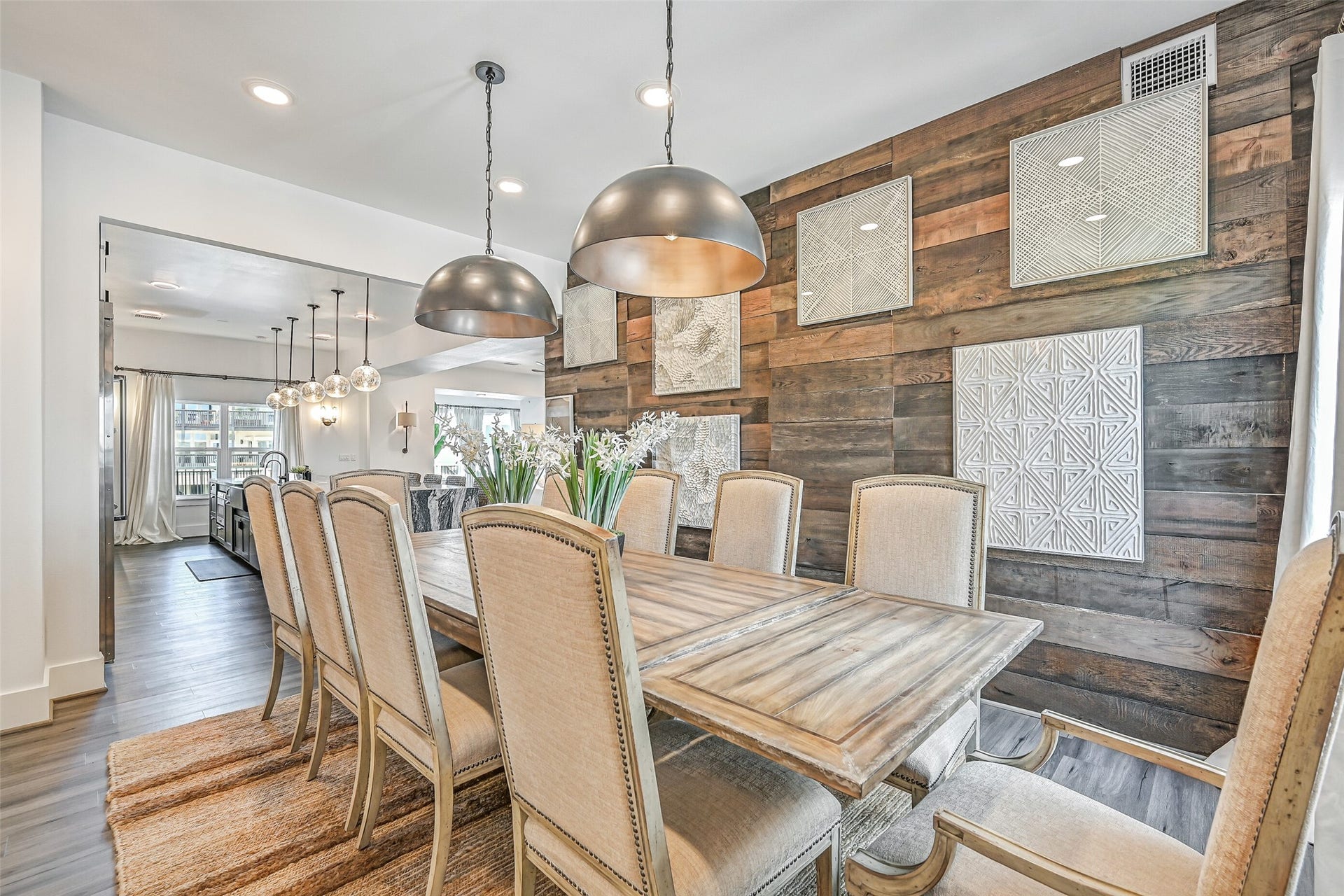 1614 Castaway Street, Tiki Island, TX 77554 Bring everyone to the table and let dinner linger. Positioned near the kitchen and living spaces, the dining area keeps meals connected to everything happening around the home.