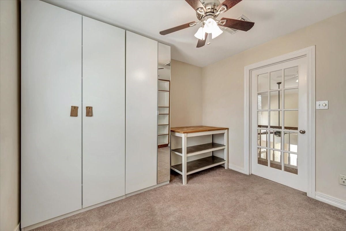 Lots of storage and work bench that is perfect for hobbies, crafts or a second office space.
