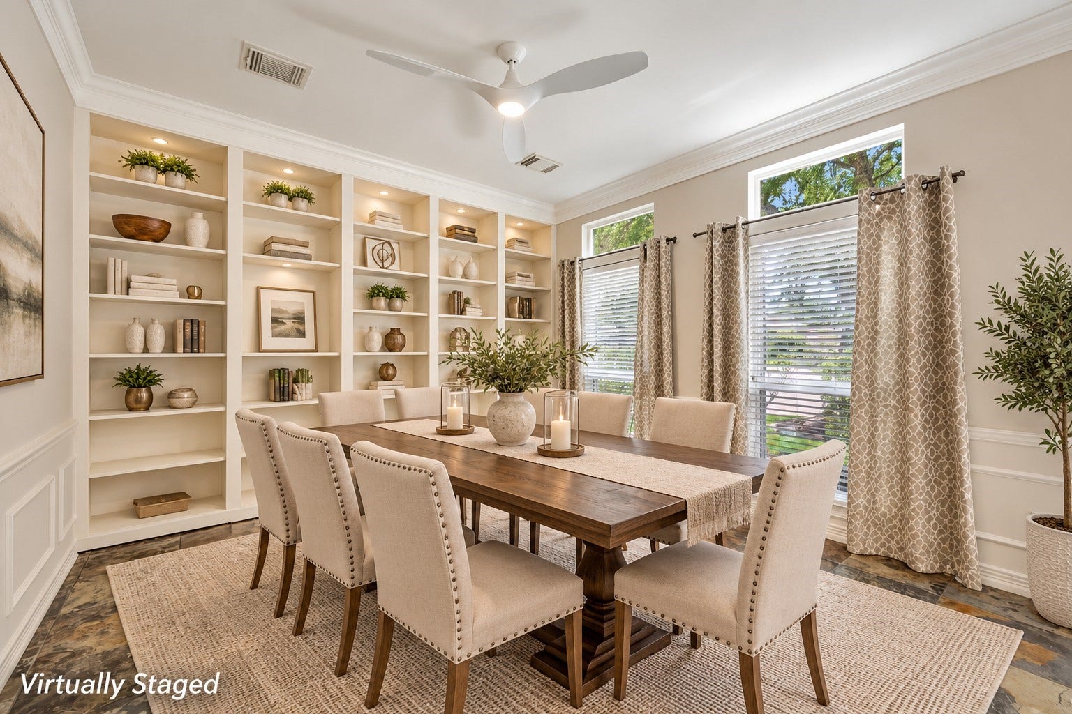 VIRTUALLY STAGED -  This is the formal dining room with staging.  Please note there are no lights in the built in's but this staging shows you the potential for this beautiful room.