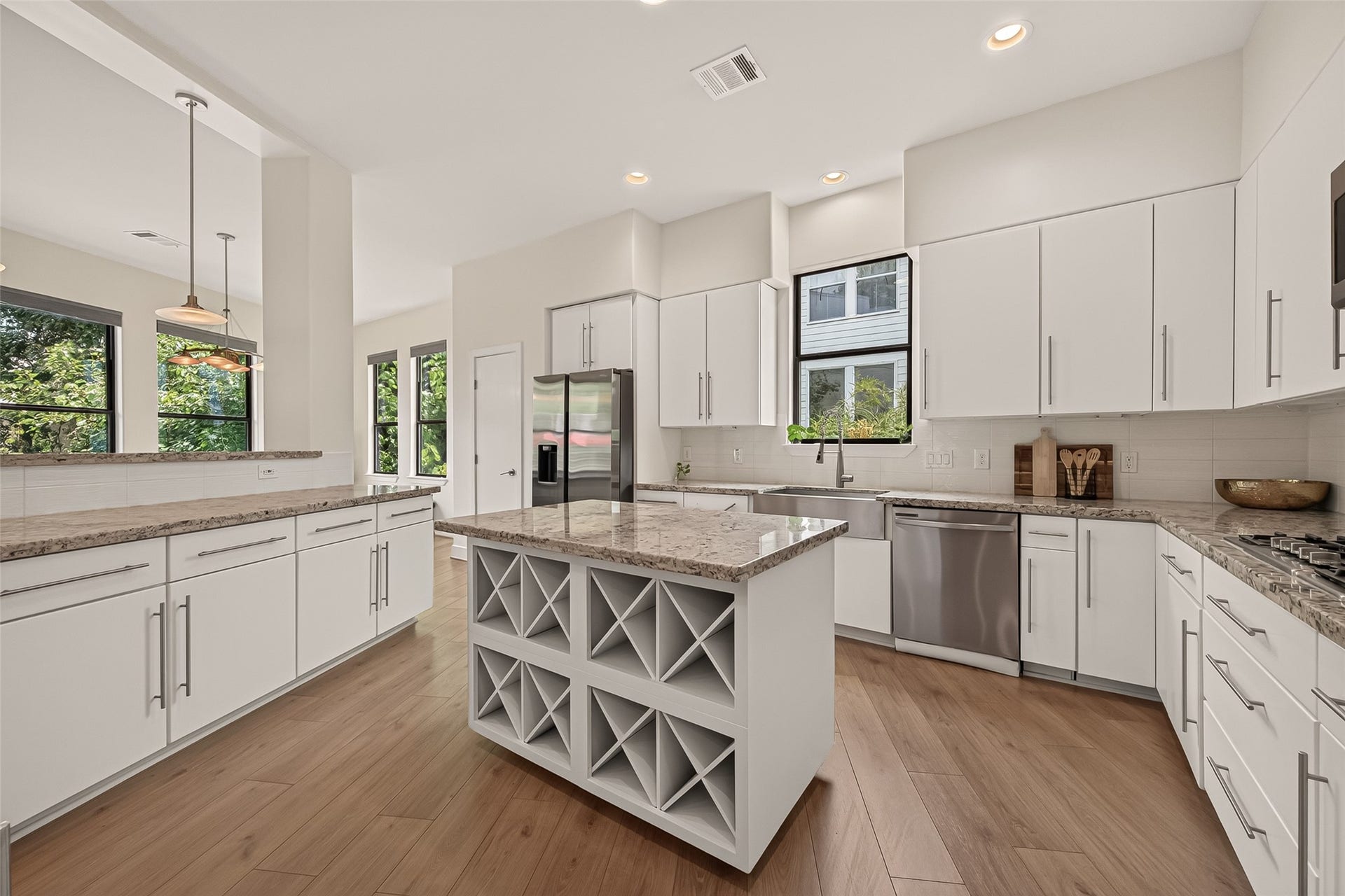The island features built-in wine storage.