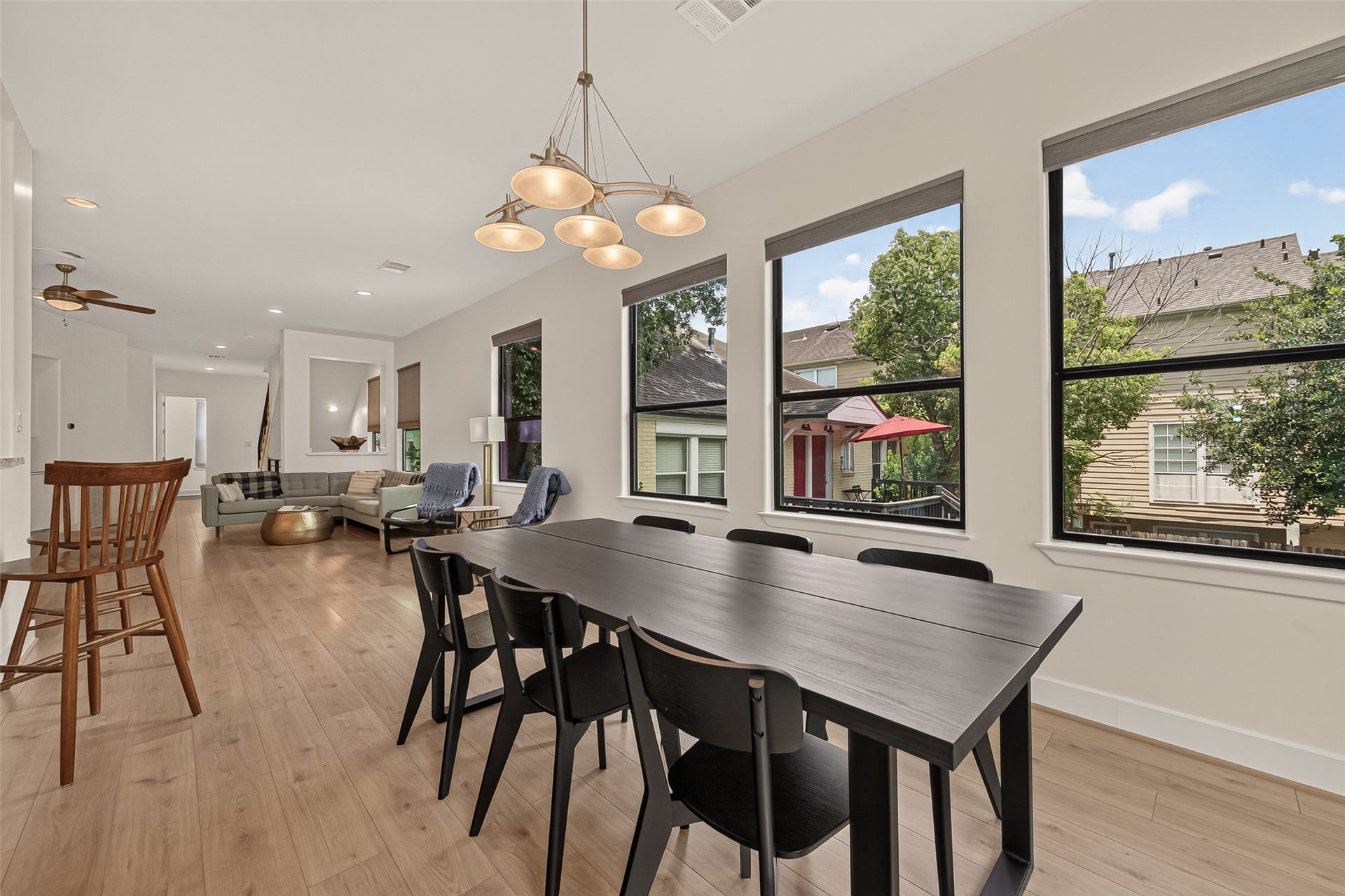 Another view of the dining area showcasing the large windows.