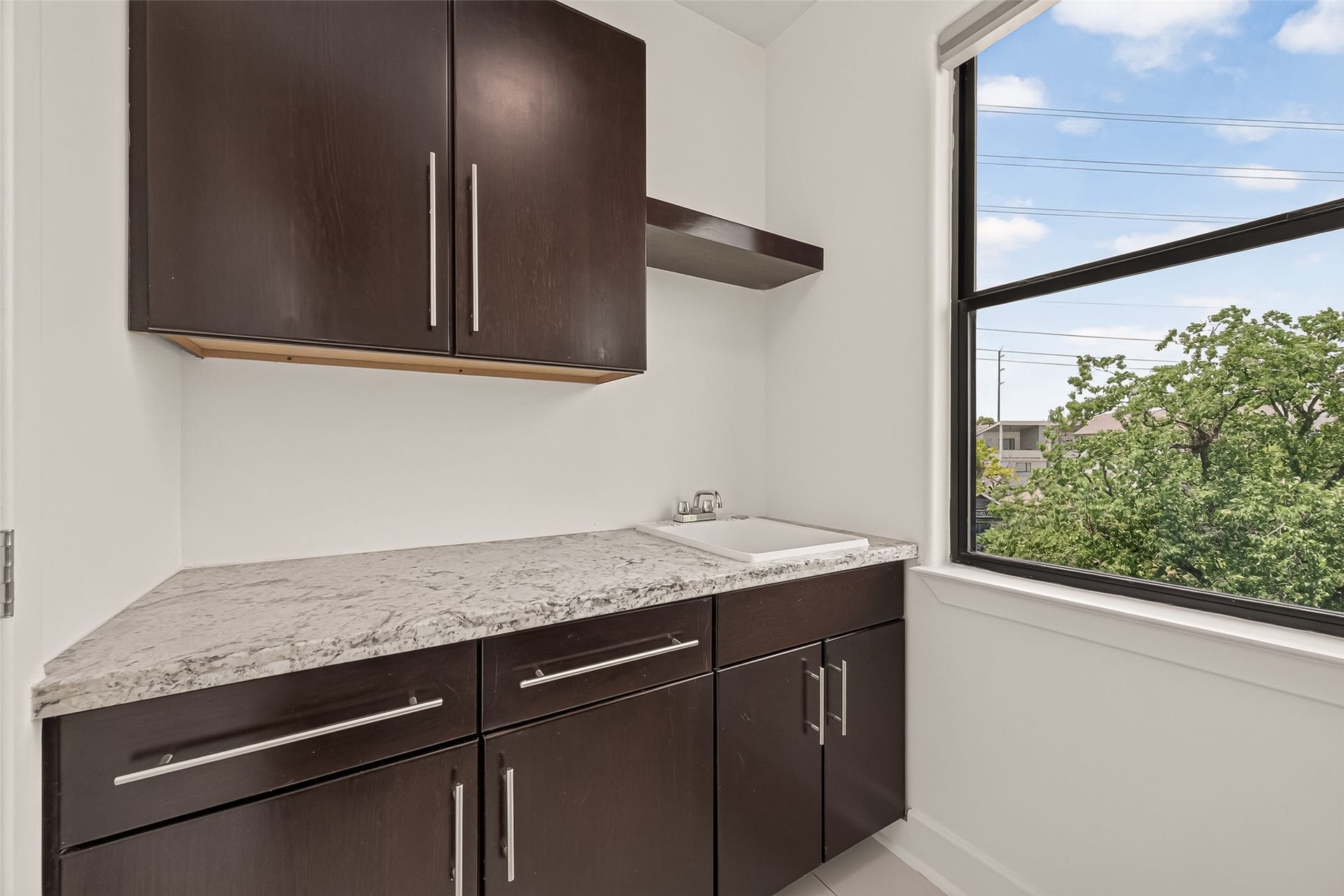 The storage area of the laundry room.