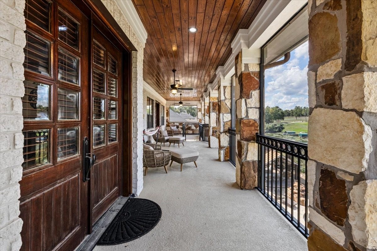 11860 Grand Harbor Boulevard, Montgomery, TX 77356 Fully screen upstairs patio- no bugs! Open your doors and windows on those beautiful Texas mornings.