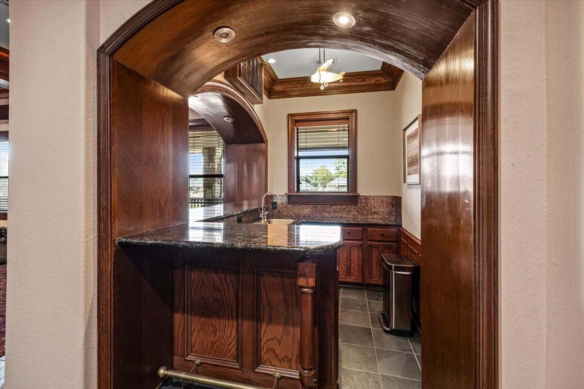 11860 Grand Harbor Boulevard, Montgomery, TX 77356 Additional wet bar upstairs with dishwasher for convenience!