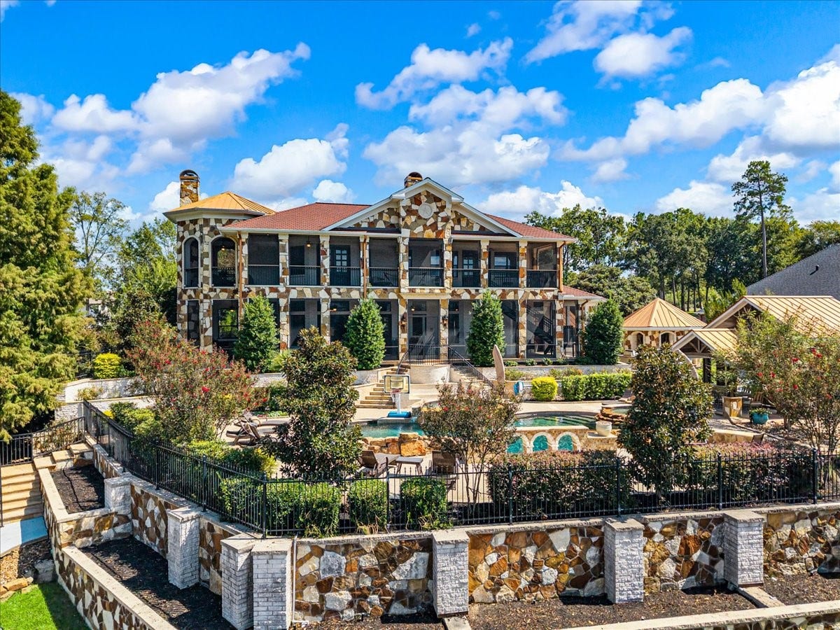 11860 Grand Harbor Boulevard, Montgomery, TX 77356 No expense spared on landscaping, irrigation, and lighting.